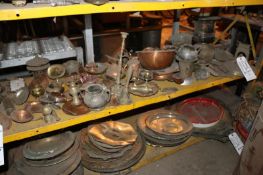 Shelf Full of Assorted Antique Copper and Brass Lids, Saucers, and Other Containers