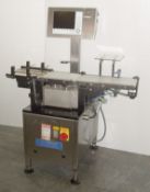 Mettler Hi-Speed VL-2 bottle check weigher with 39" x 7.5" variable speed belts. Triple belt feed