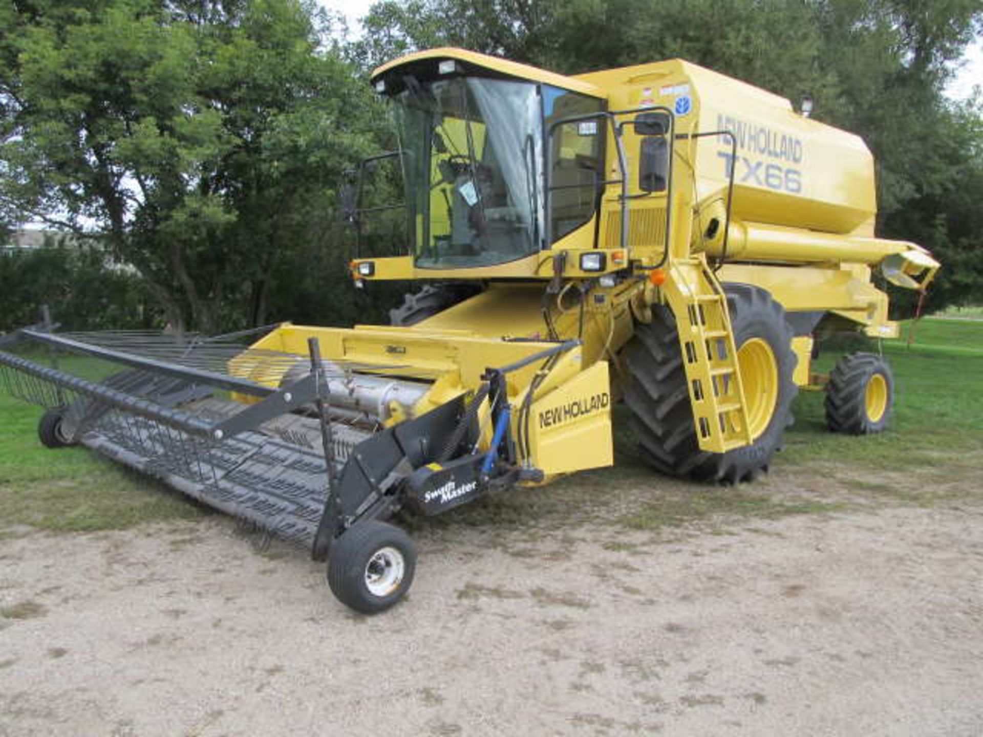 NEW HOLLAND TX66 SP COMBINE; 1886/2287 Sep/Eng. Hours, Swathmaster Pick-up, straw chopper & Vittetoe