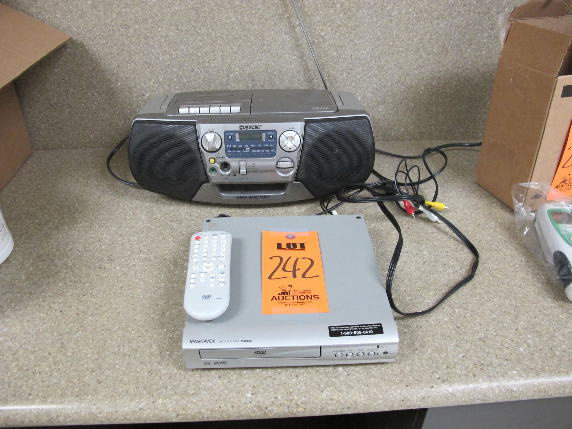 Lot containing Magnavox DVD Player with Remote & Sony Portable AM/FM DVD Cassette Player