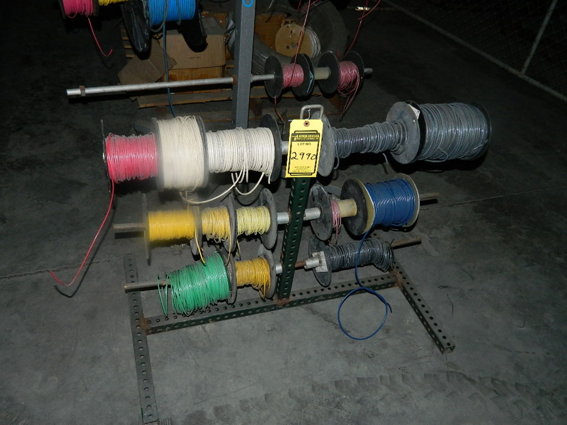 RACK OF SPOOLS OF WIRE