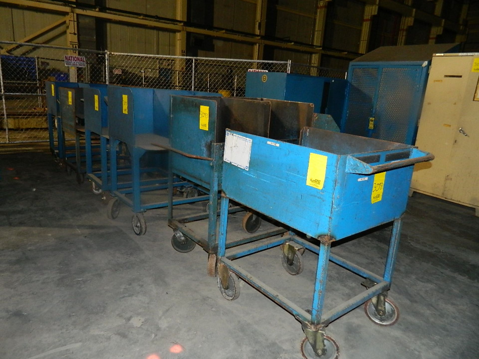 LOT OF METAL CART BINS ON WHEELS