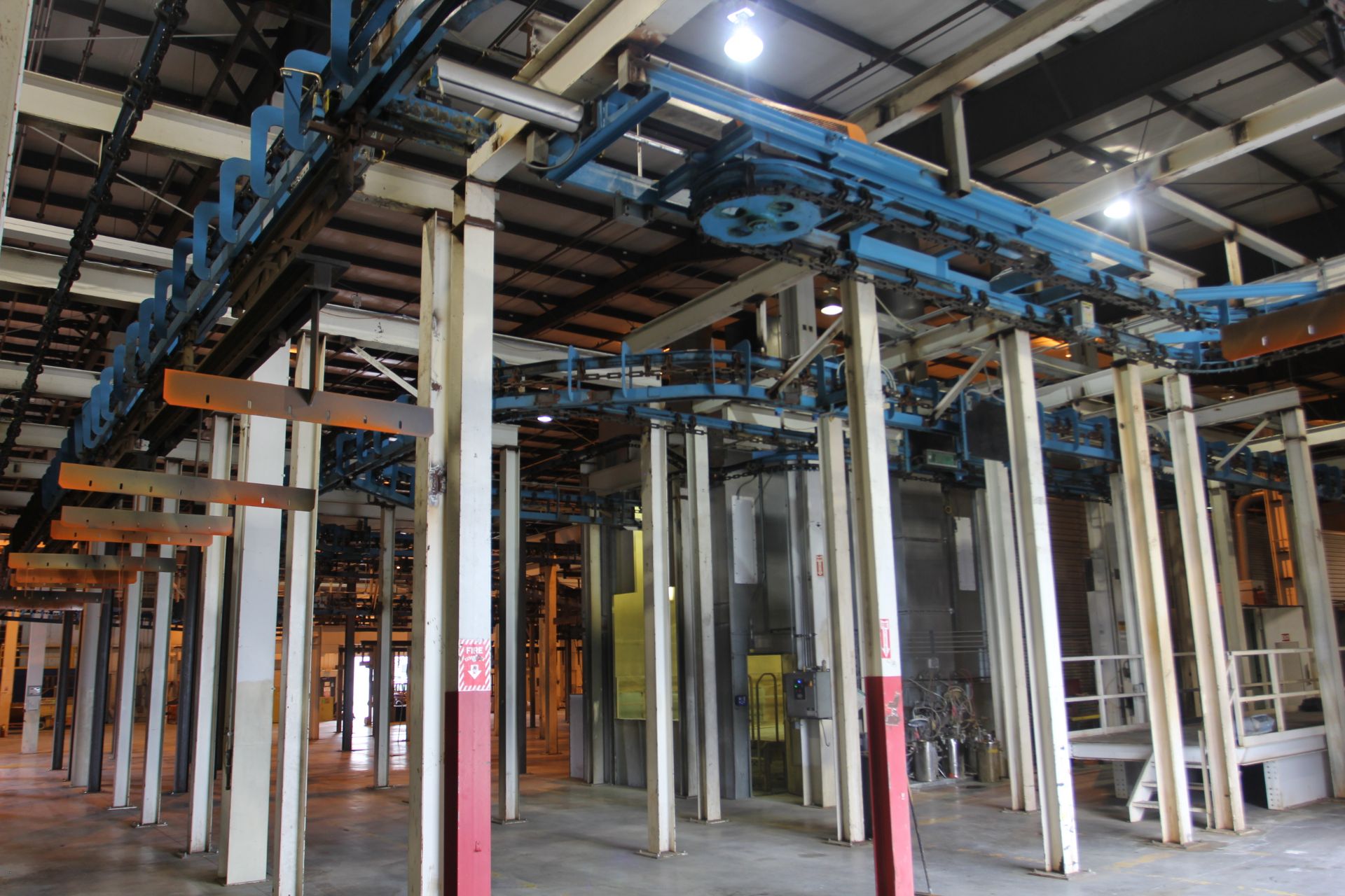 CONVEYOR SYSTEM W/ ON/OFF LOAD LOWERATORS; 3,000 LINEAR FEET' 3,000 LBS PER CARRIER LOAD CAPACITY