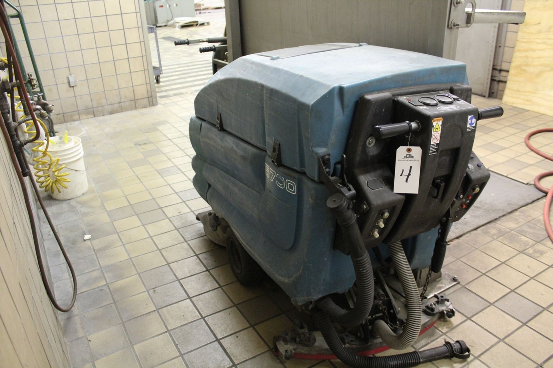 Tennant Floor Scrubber, M# 5700, S/N 5700-14949, 36 Volt, W/ Charger, Type E | Rigging Fee: $75