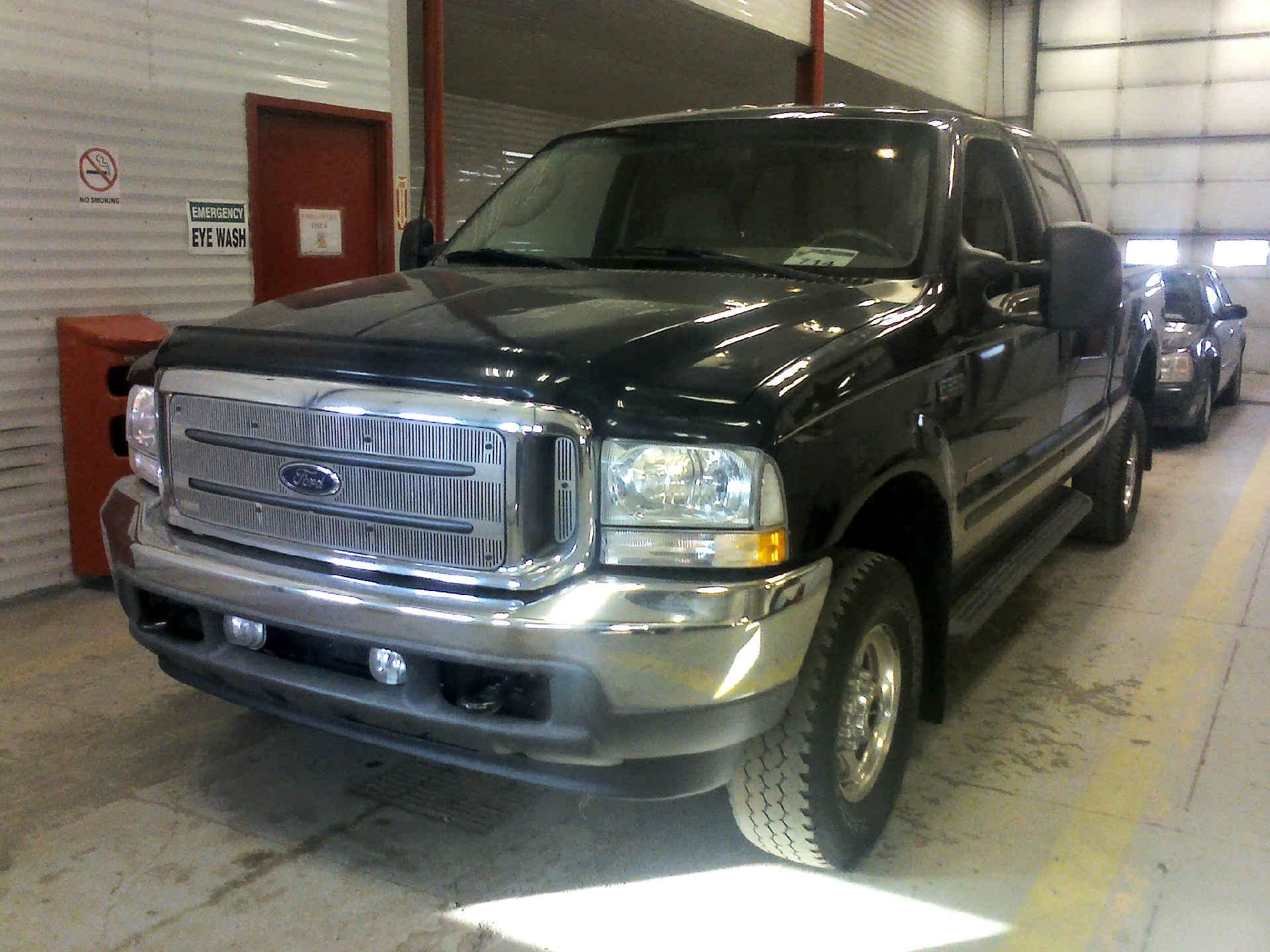 2003 FORD F-350 SD LARIAT CREW CAB 4WD 6.0L V8 OHV 32V TURBO DIESEL AUTOMATIC SN:1FTSW31P43ED70797