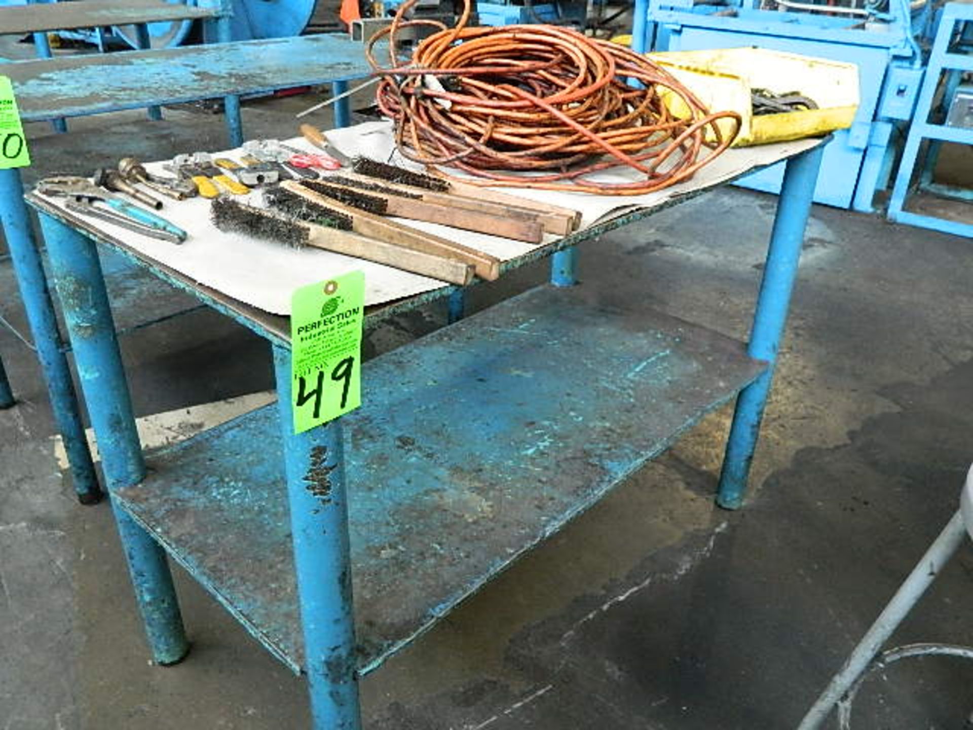 Steel Table 24" x 48" with misc. tools, electrical cords