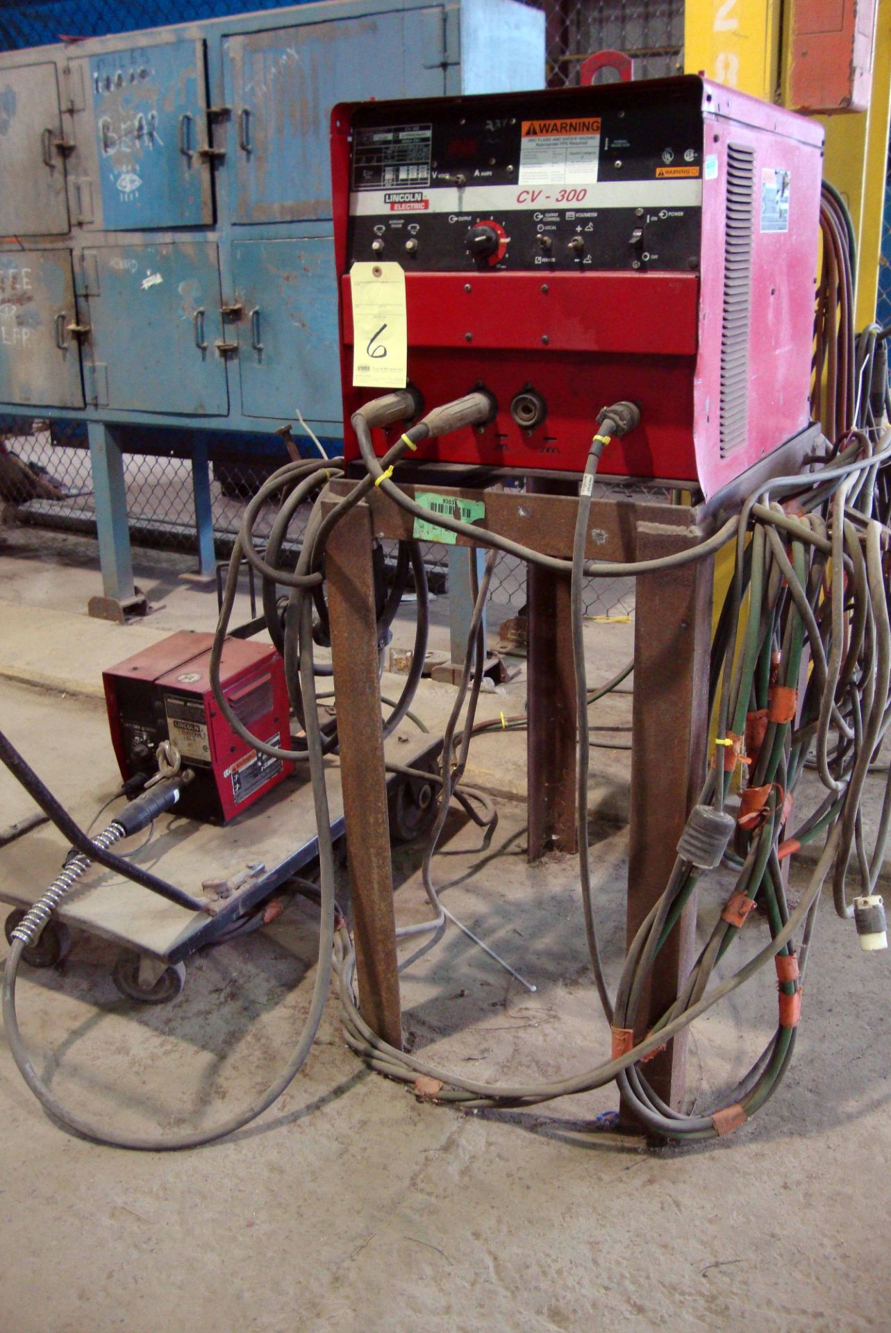 MIG WELDER, LINCOLN MDL. CV300, 300 amps @ 32 v., 100% duty cycle, on fabricated metal stand,