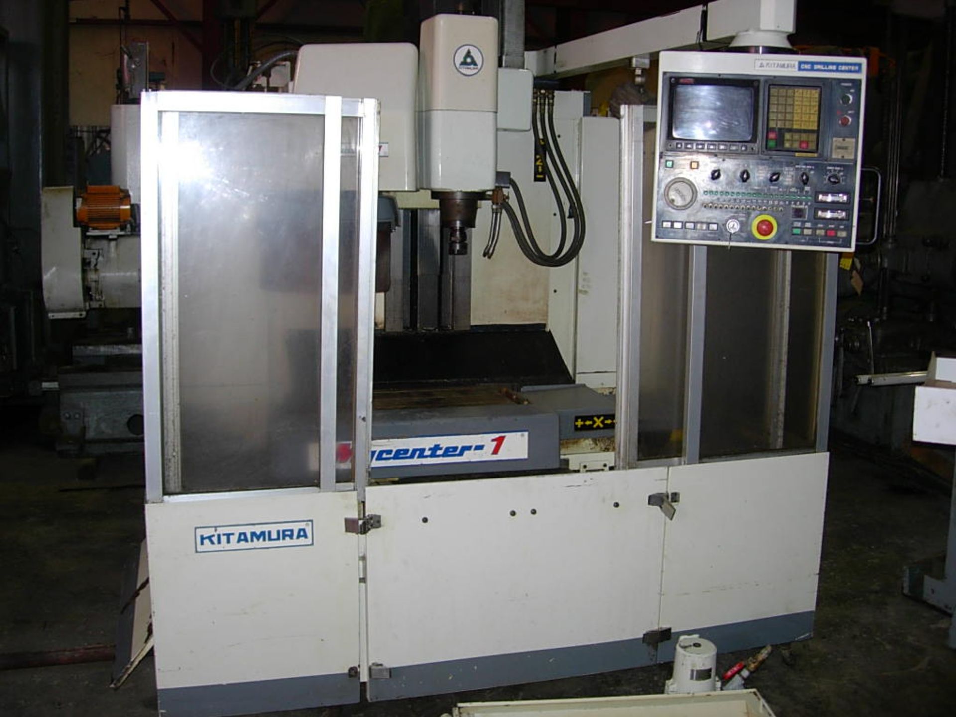 CNC VERTICAL MACHINING CENTER, KITAMURA MDL. MYCENTER 1B, Fanuc 10M CNC control, 12" x 27" table,