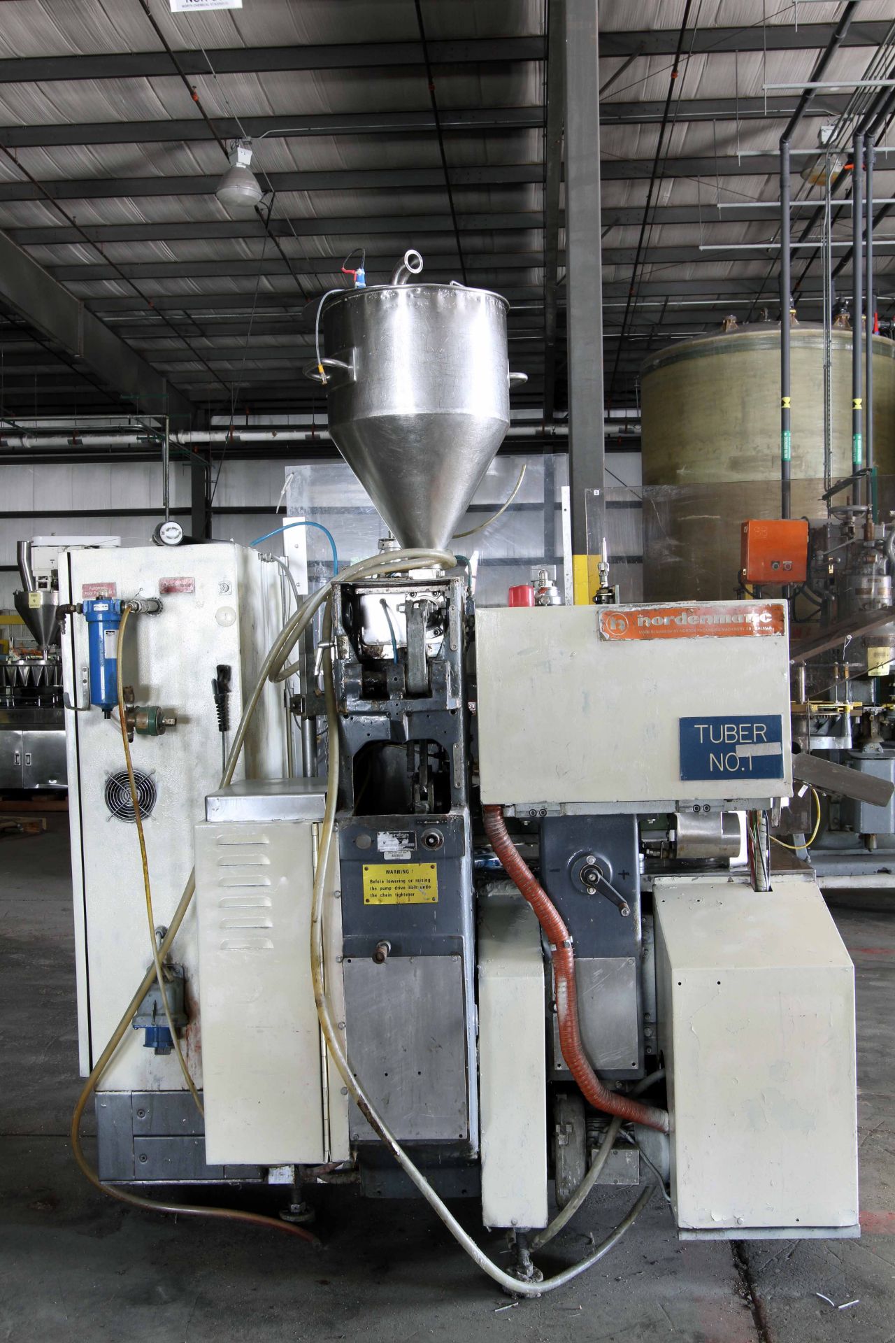 AUTOMATIC ROTARY PLASTIC TUBE FILLER, NORDEN MDL. NM620HA, stainless steel feed hopper, mixed - Image 2 of 7