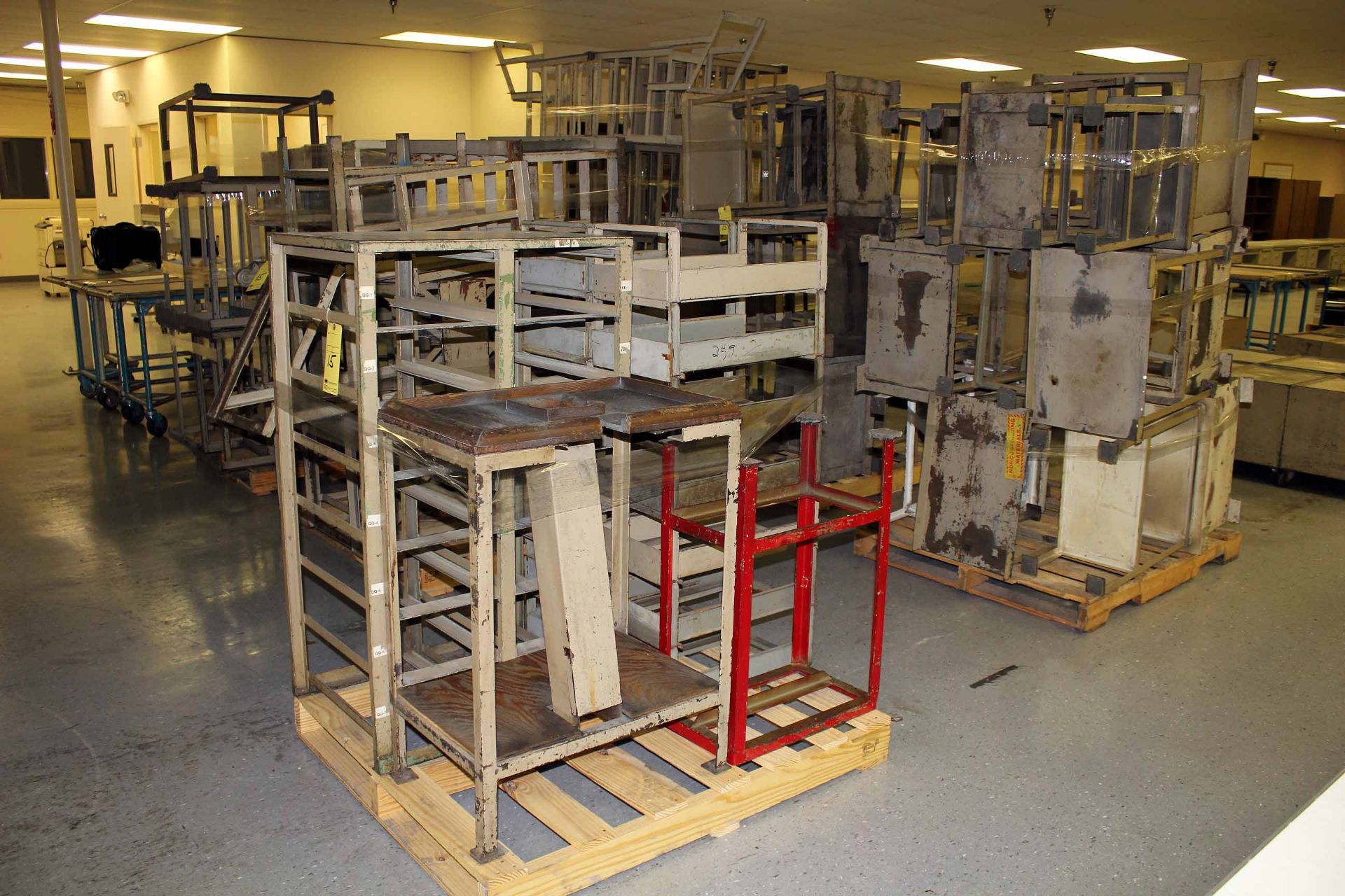 LOT OF METAL TOTE STANDS  (on six pallets)