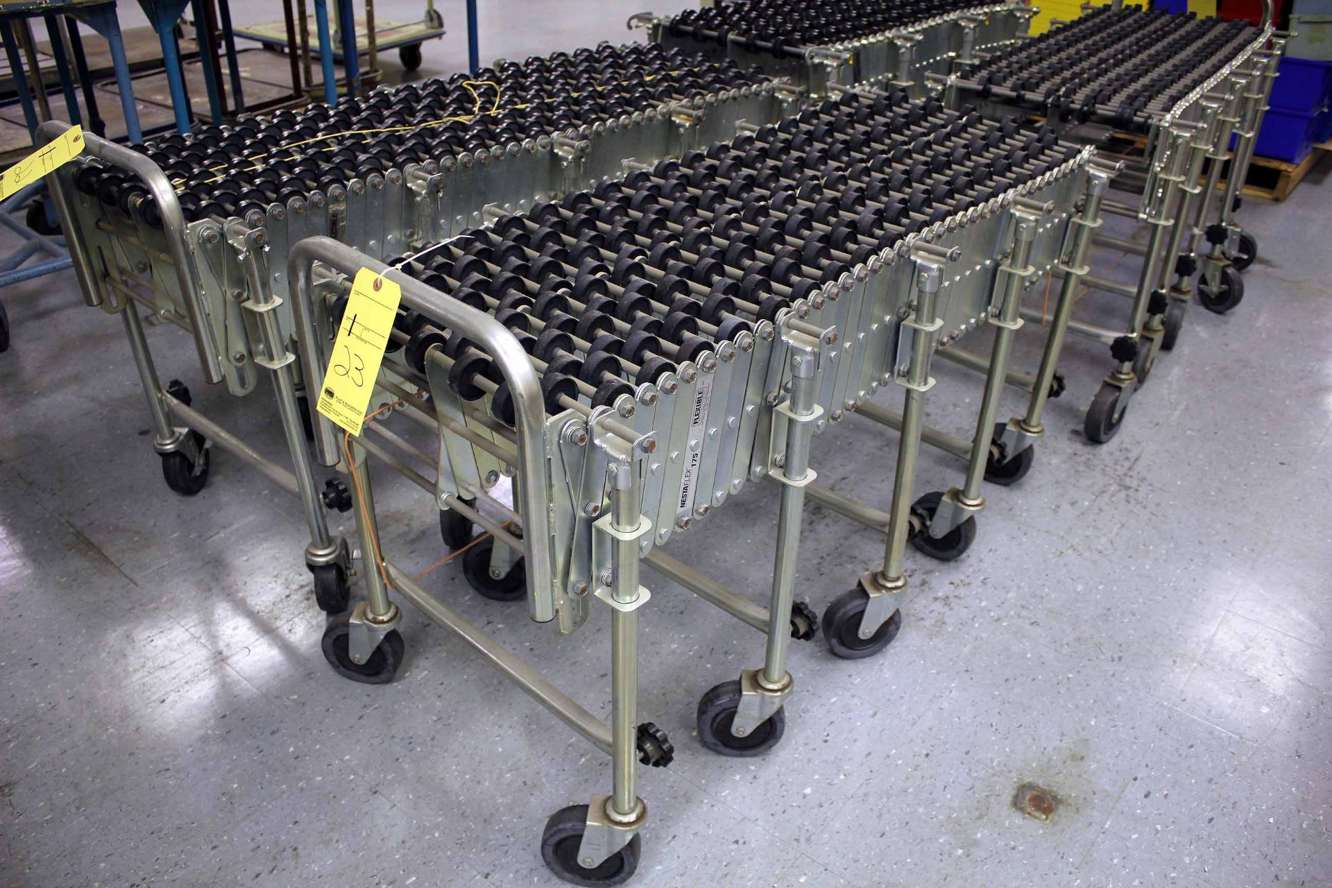 EXPANDABLE SKATE WHEEL CONVEYOR