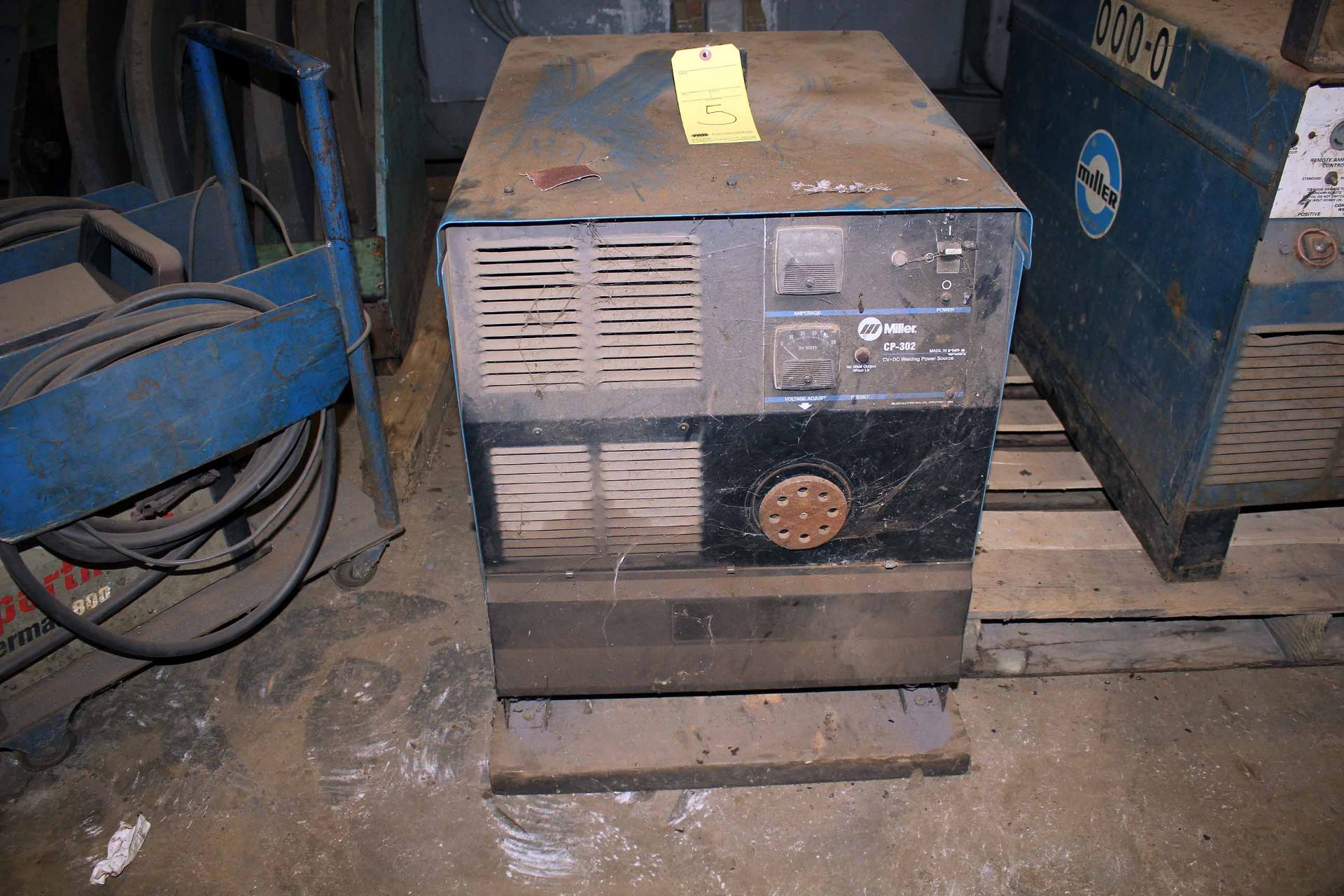 WELDING MACHINE, MILLER MDL. CP302, 300 amps @32 v., 100% duty cycle, S/N LE497866.