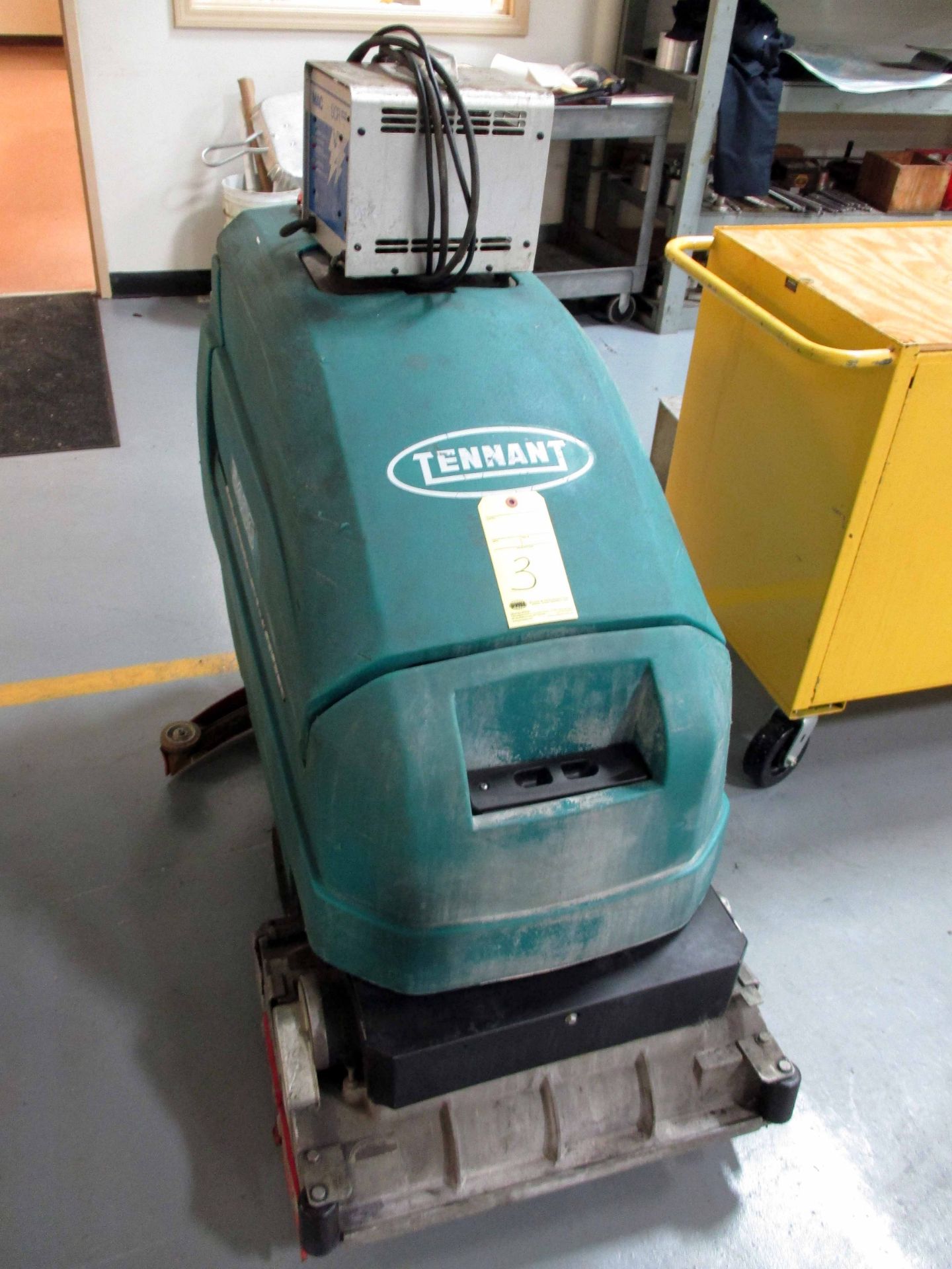 ELECTRIC FLOOR SCRUBBER, TENNANT