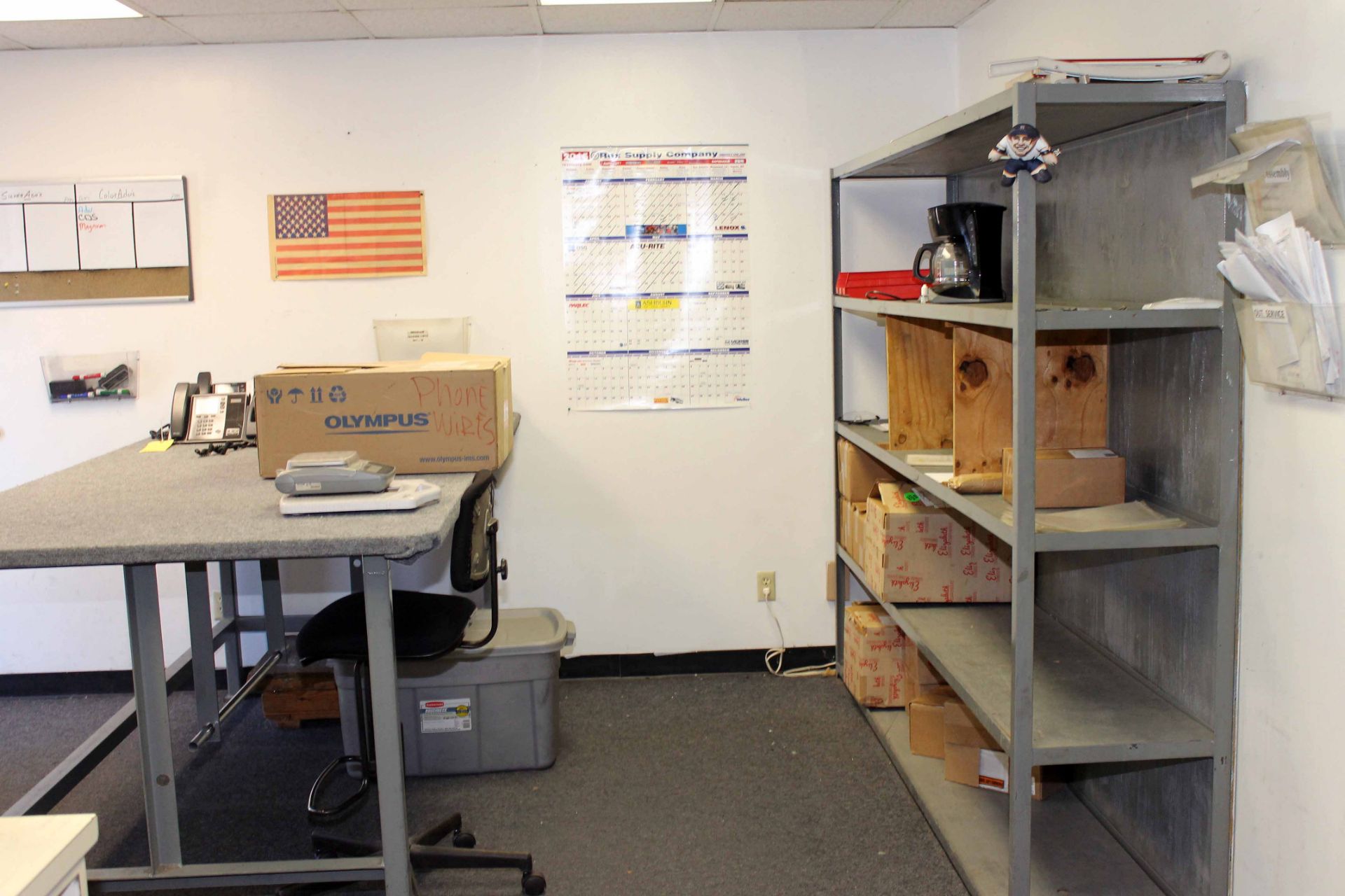 LOT REMAINING CONTENTS OF SHIPPING ROOM: 4' x 8' steel table, steel shelving units, packing