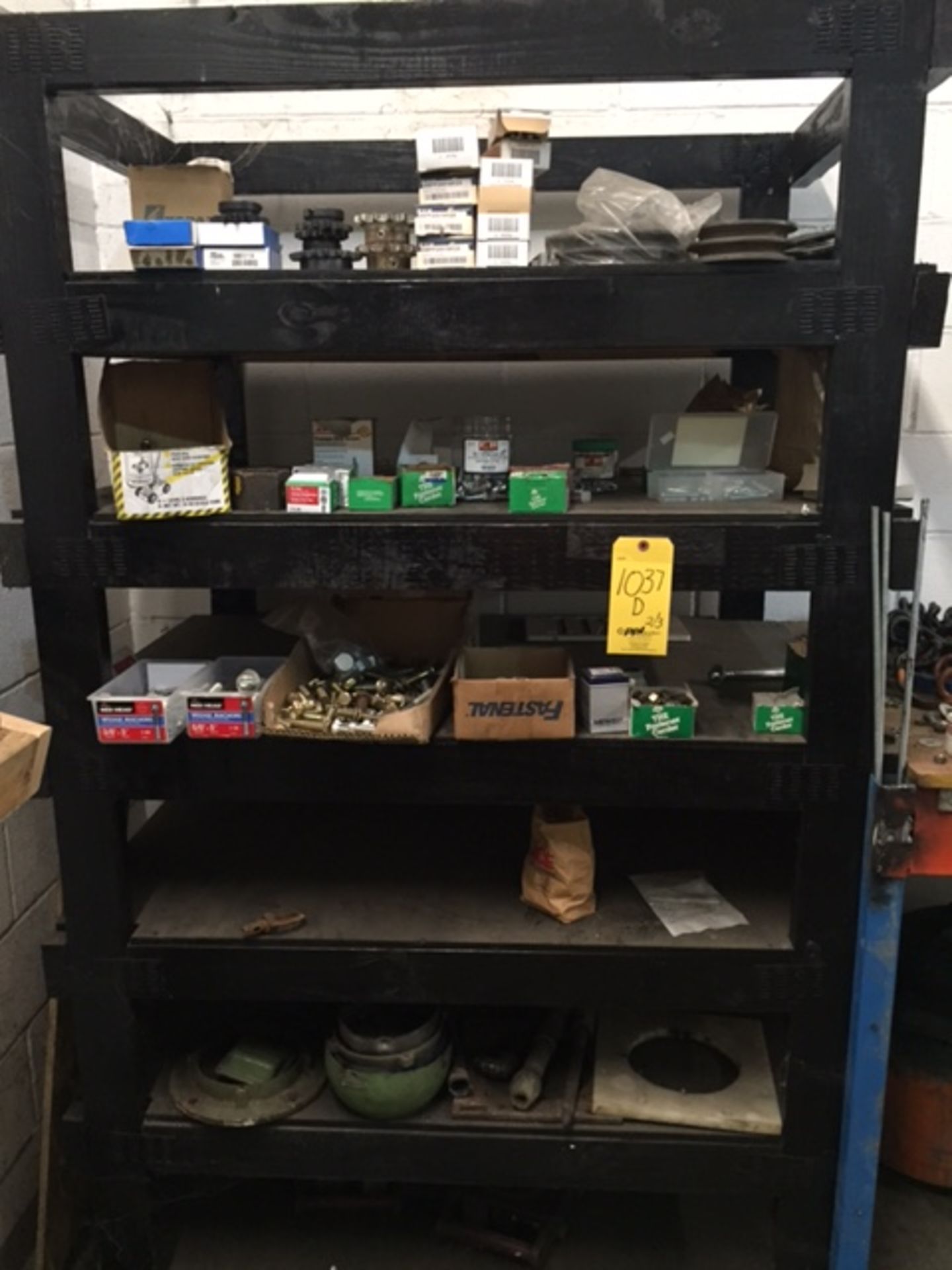 Contents of 2 shelves including electrical contactors, wire, fuses, pipe fitting, fastners,