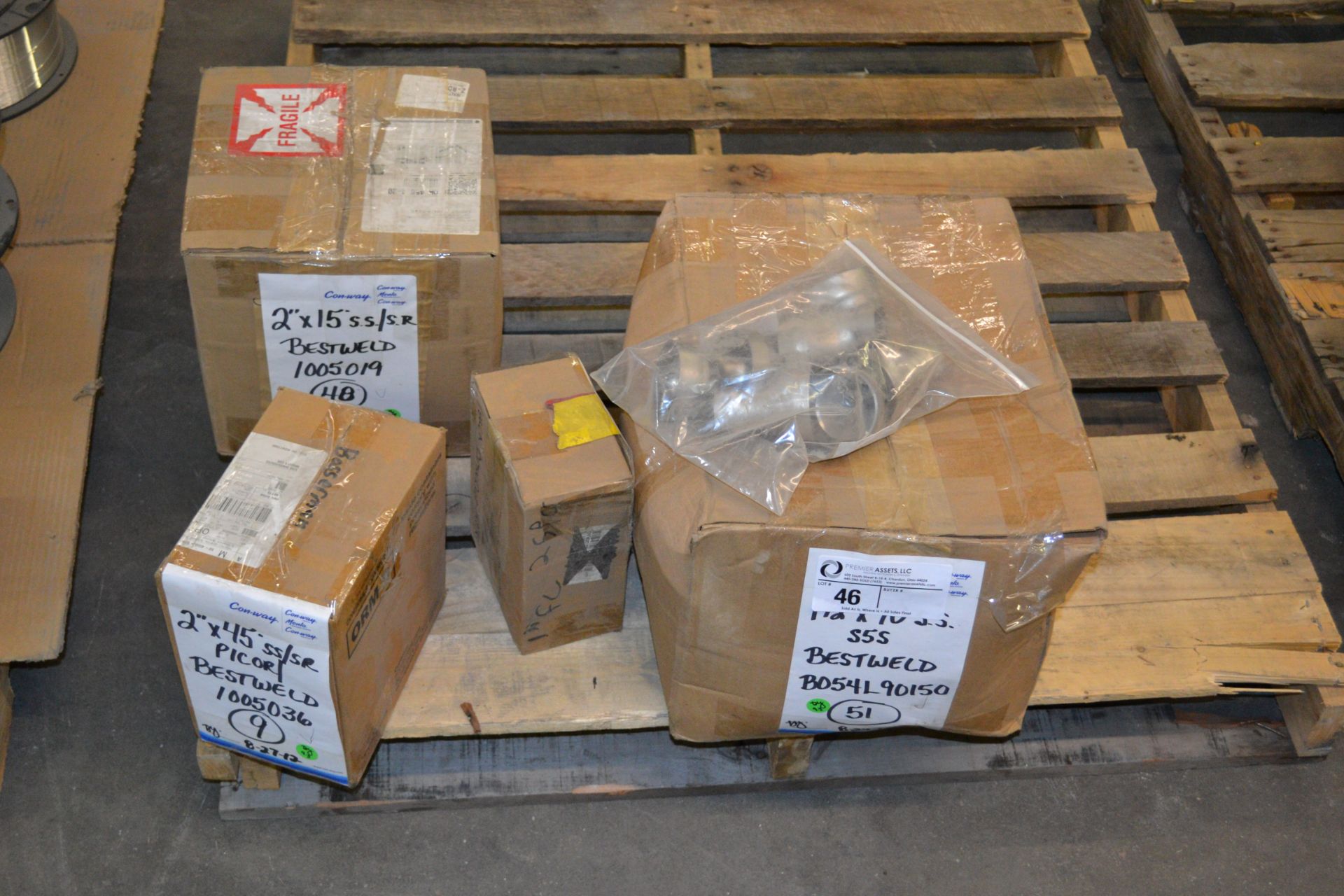 skid with boxes of Bestweld SS/SR fittings, 2" x 15*, 2 x 45* & 1.5" x 90*