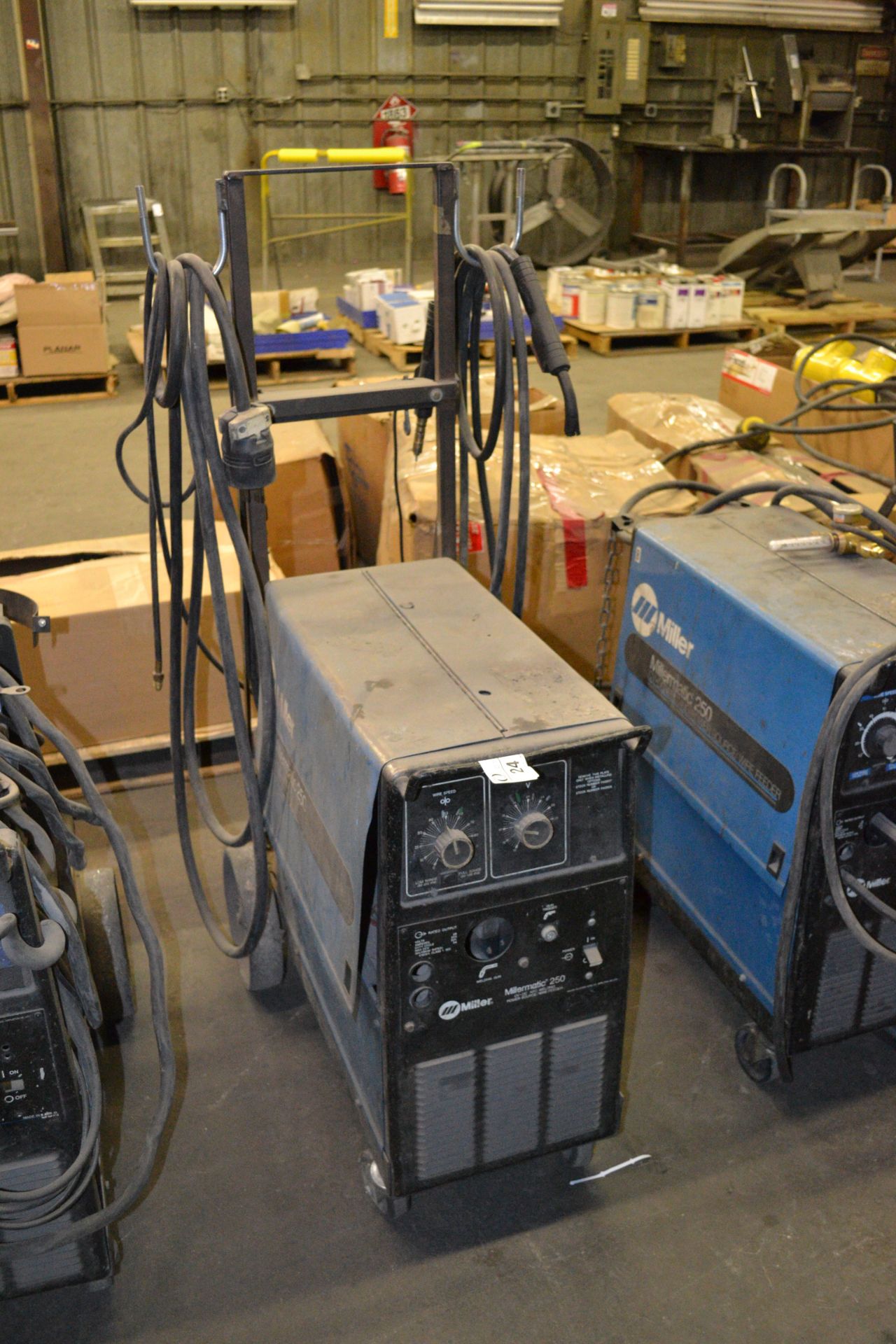 Millermatic 250 CV/DC welder, wire feeder  SN: KD533509