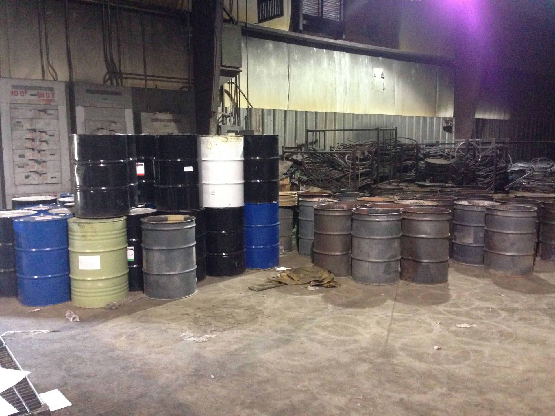 Approximately 70, 55 gallon steel barrels