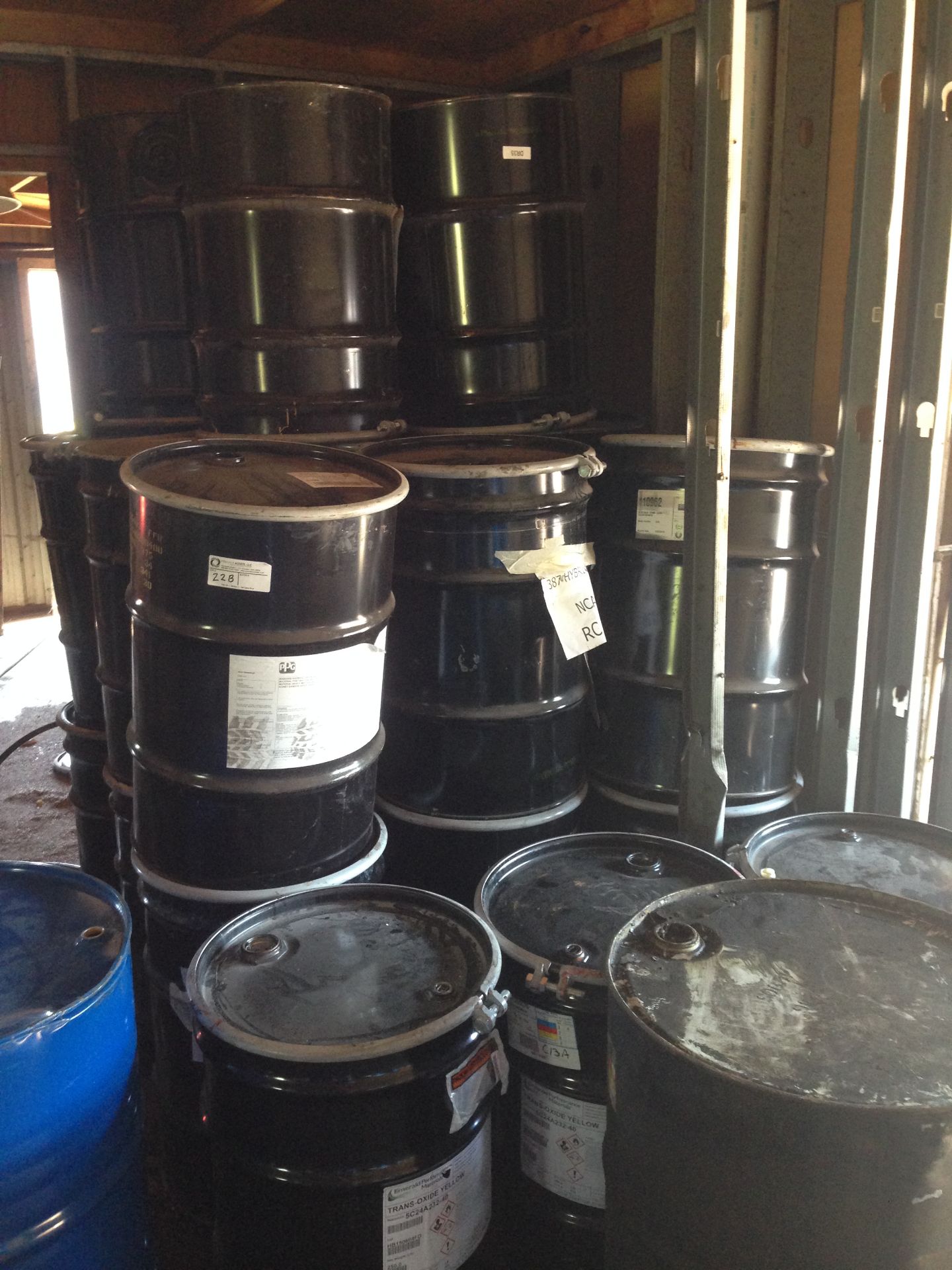 Approximately 25, 32 gallon steel barrels