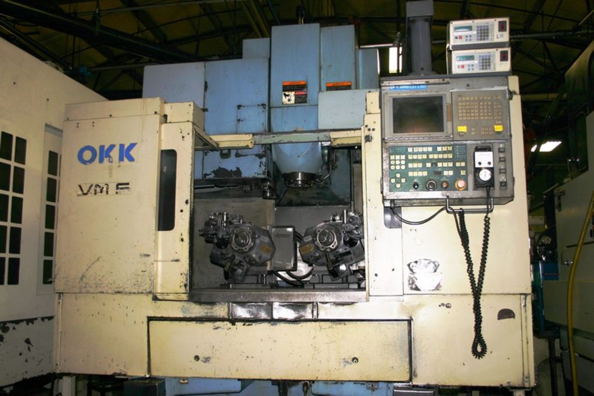 OKK Model VM5-II CNC 3-Axis 40 Taper Vertical machining Center, S/N 111, New 1997