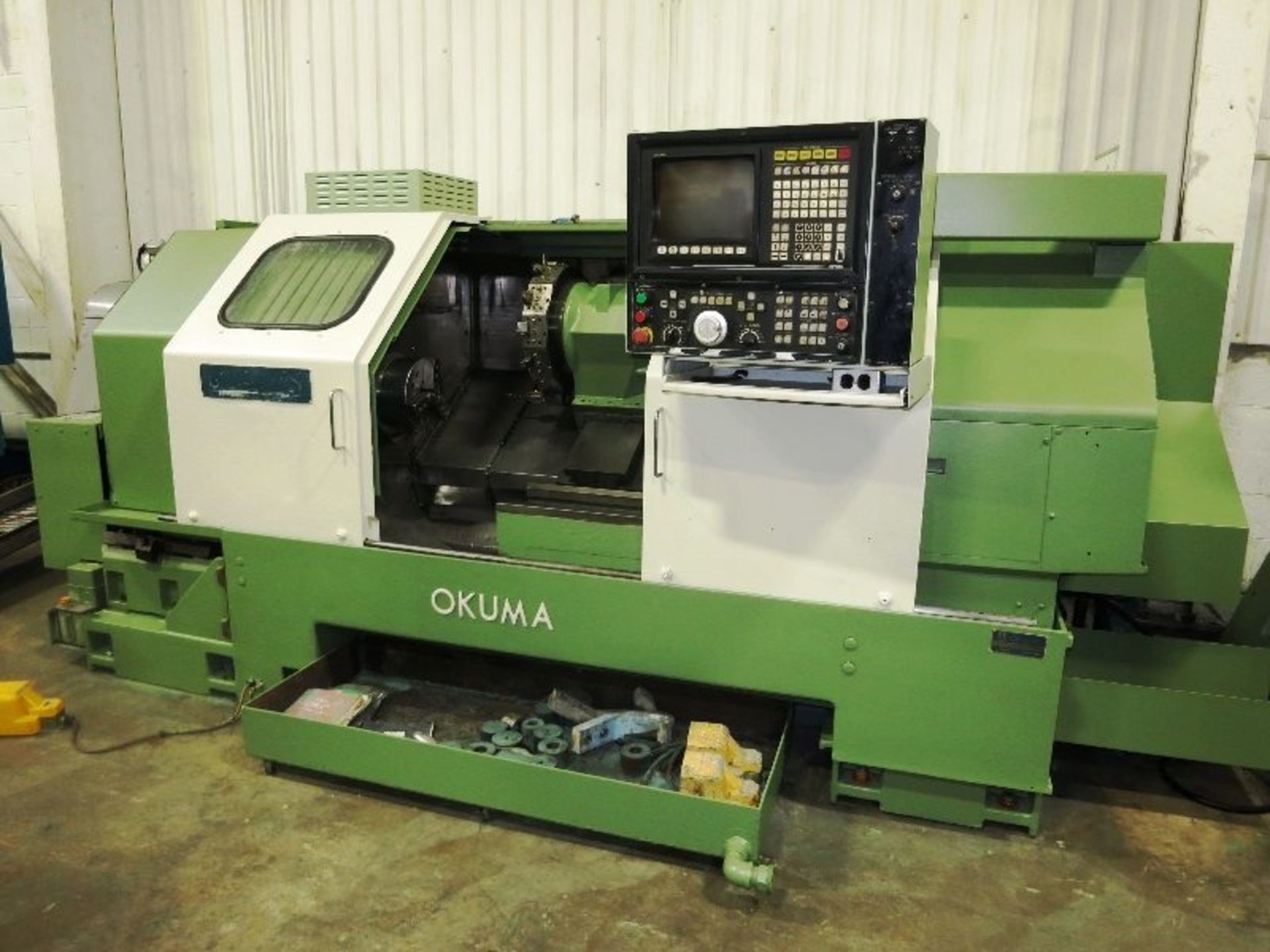 14" X 50" OKUMA MODEL LB25-2SC-1250 2-AXIS CNC TURNING CENTER, S/N 0202-0656, NEW 1990