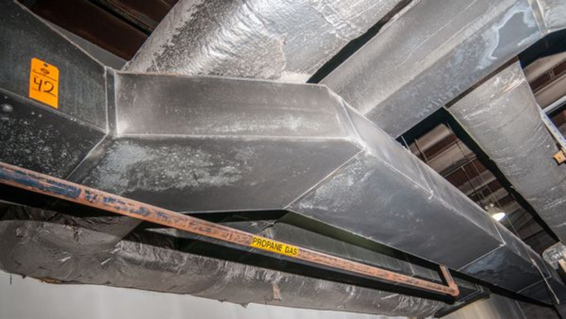 METAL DUCT MATERIAL & BLOWERS THROUGHOUT MAIN BUILDING EXCLUDING OFFICE AREAS