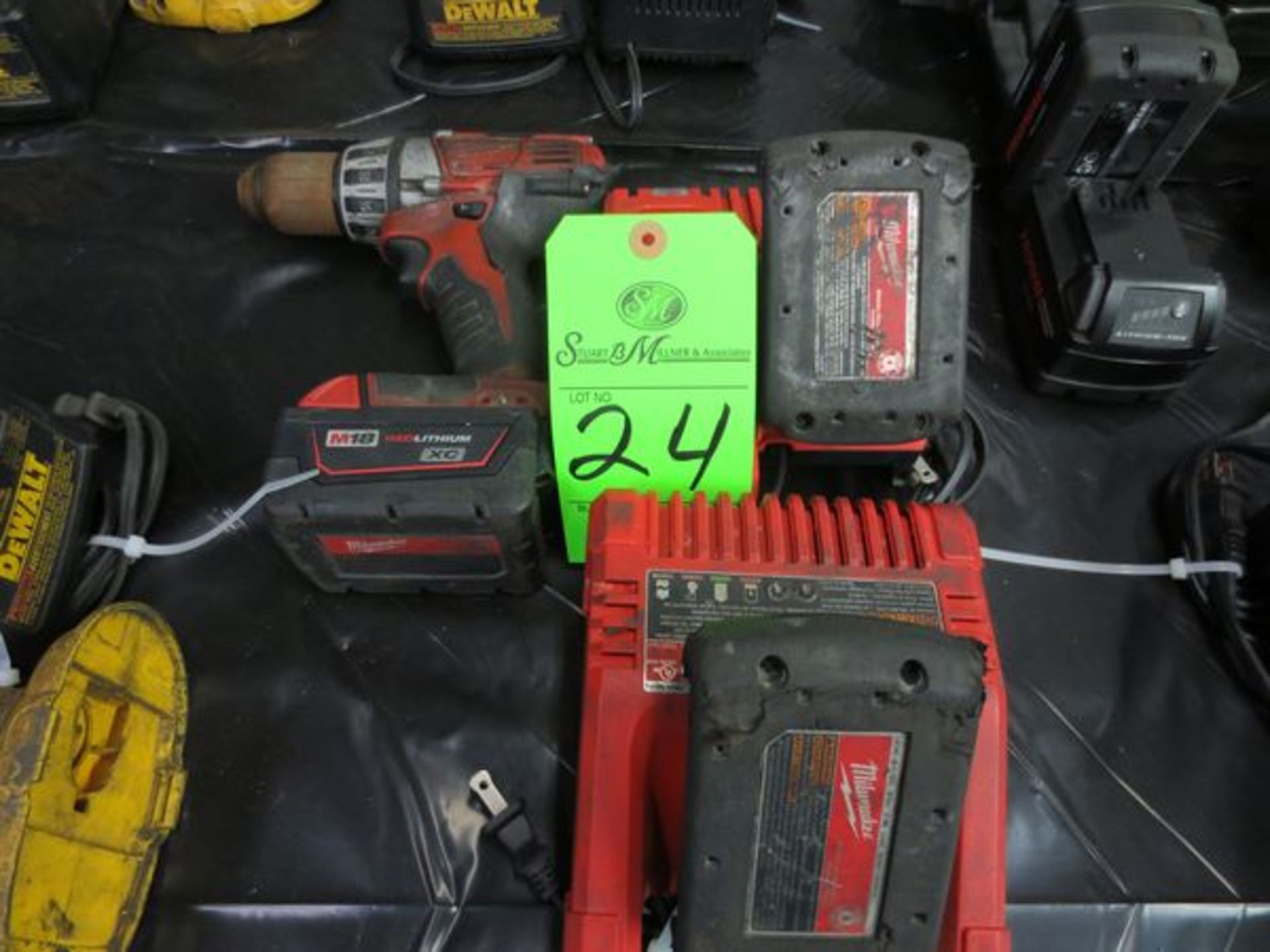 Milwaukee 1/2" cordless drill with two chargers three batteries