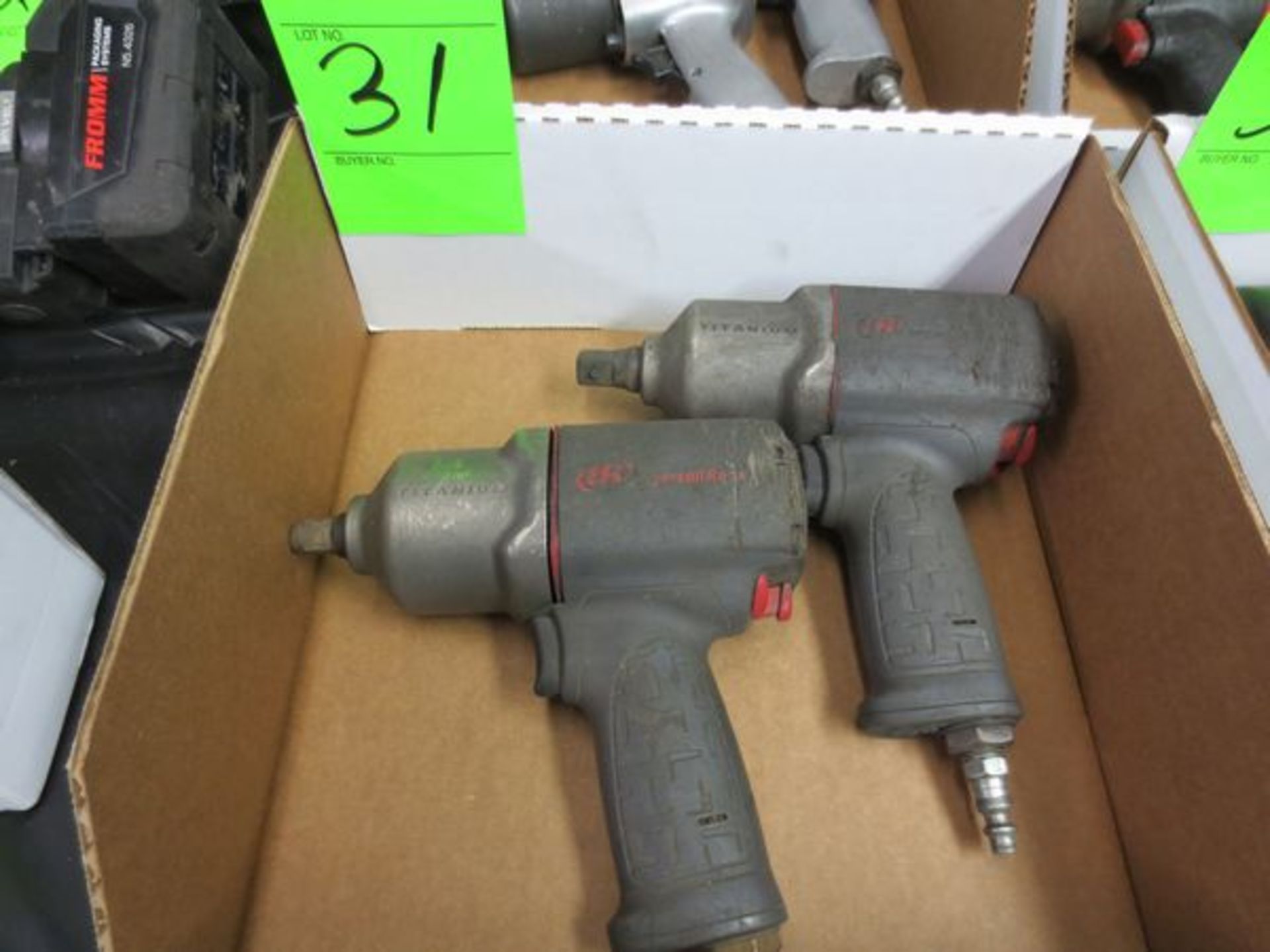 Two Ingersoll Rand pneumatic impact wrenches