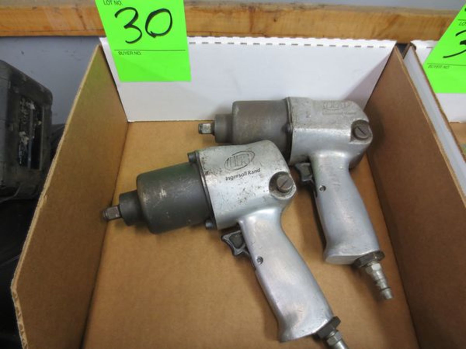 Two Ingersoll Rand pneumatic impact wrenches