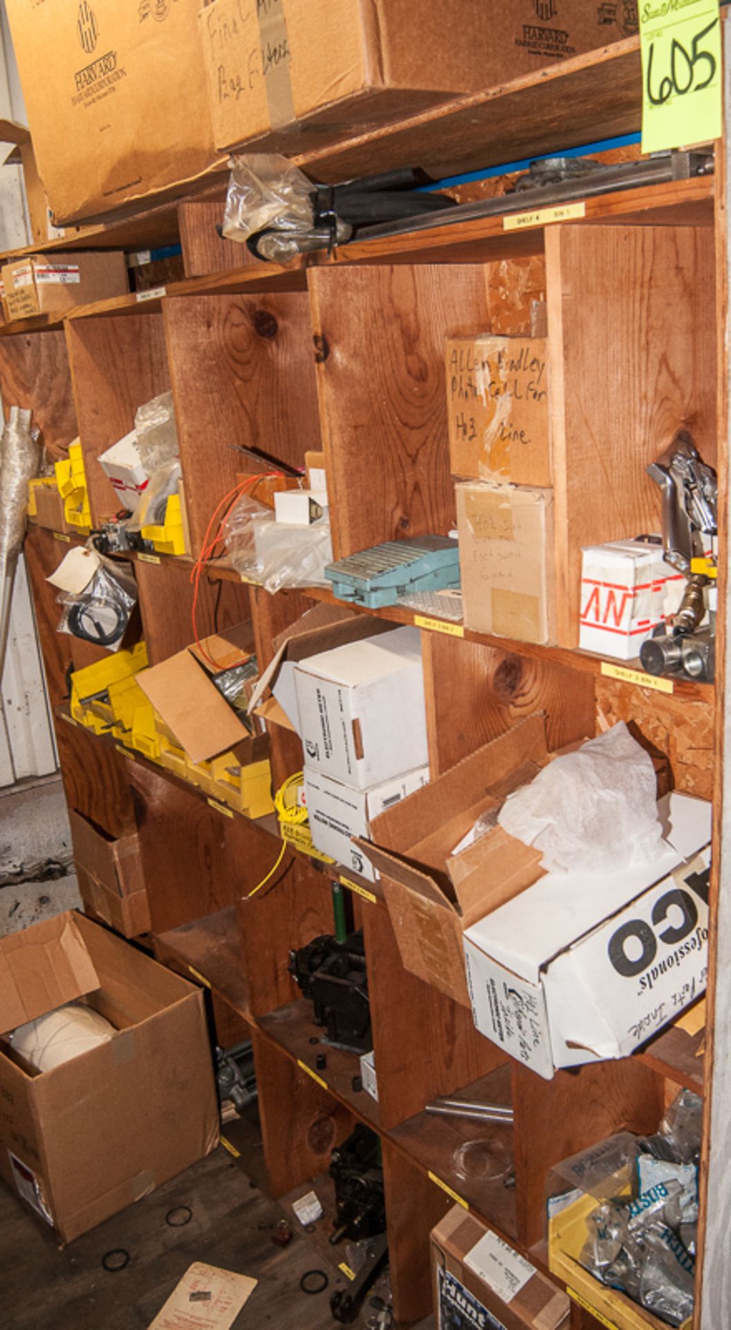 Contents of shelf, assorted electrical, hydraulic and machine parts