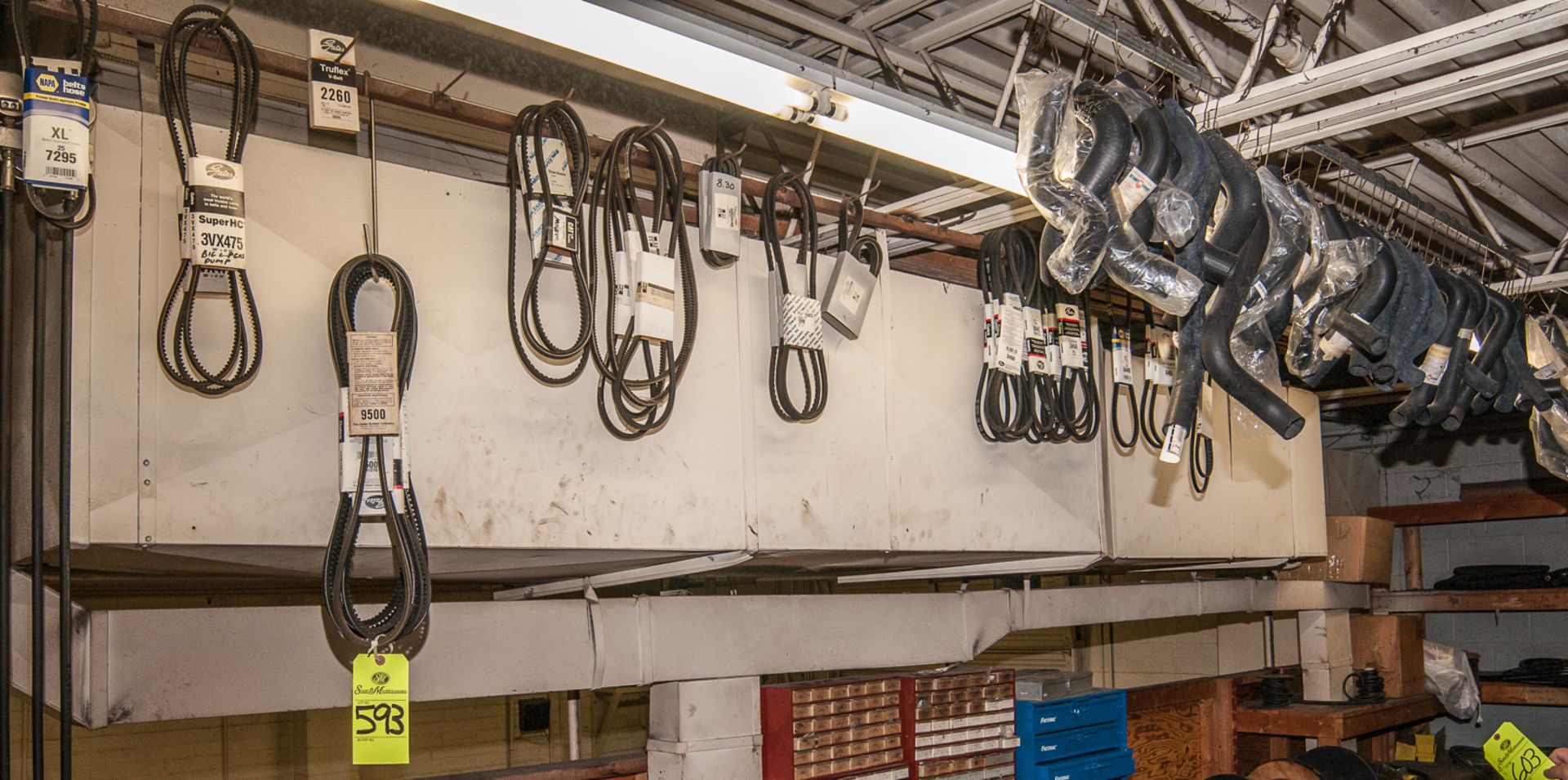 Belts and hoses hanging from ceiling