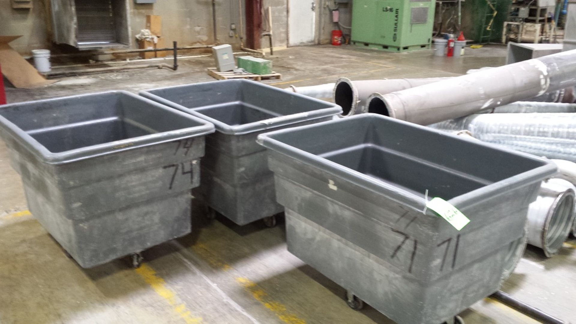 Nine plastic rolling carts