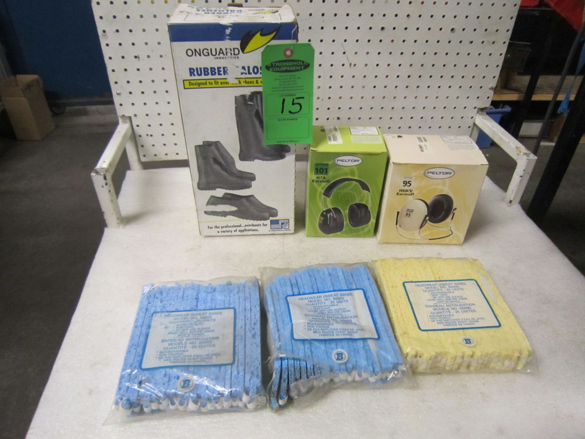 Lot of Shop Safety Supplies including rubber galoshes, 3 bags of sweat bands, assorted sound ear