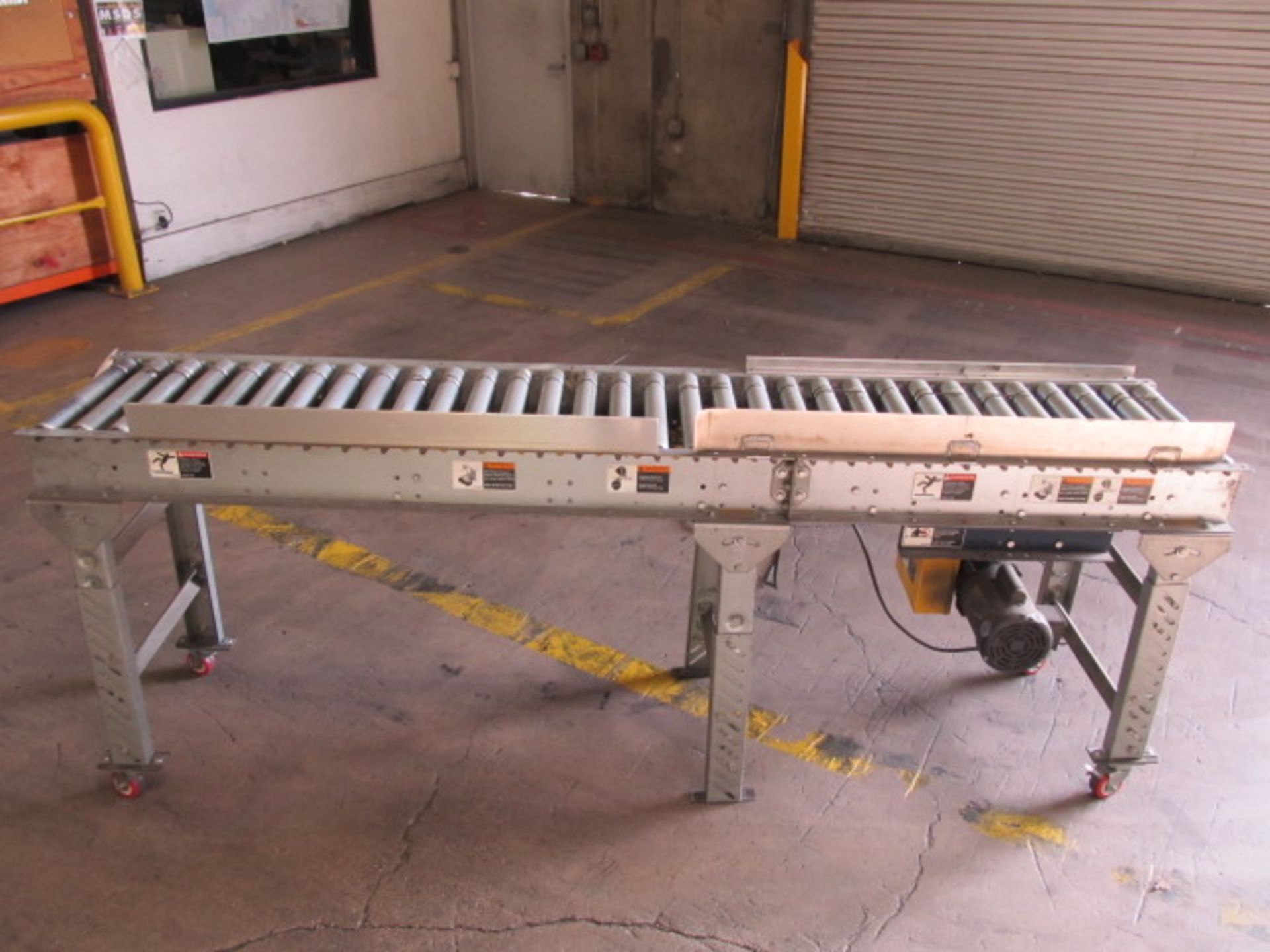 Electric Motorized Conveyor On Casters, Measures Approx. 7Ft.L x 18in.W. Asset Location: West