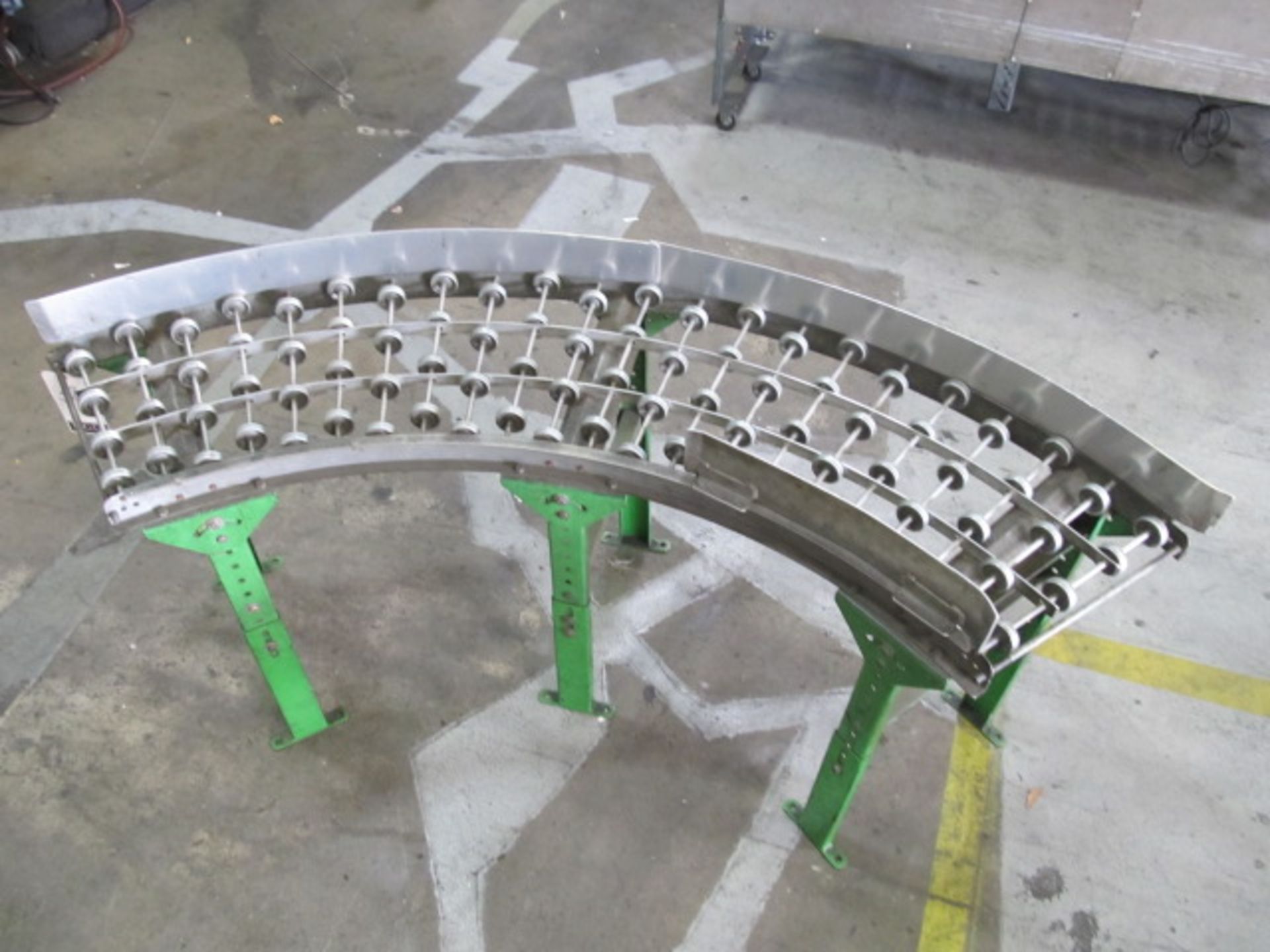 Stationary High Adjustable Curved Conveyor, Measures Approx. 6Ft.L x 18in.W. Asset Location: West