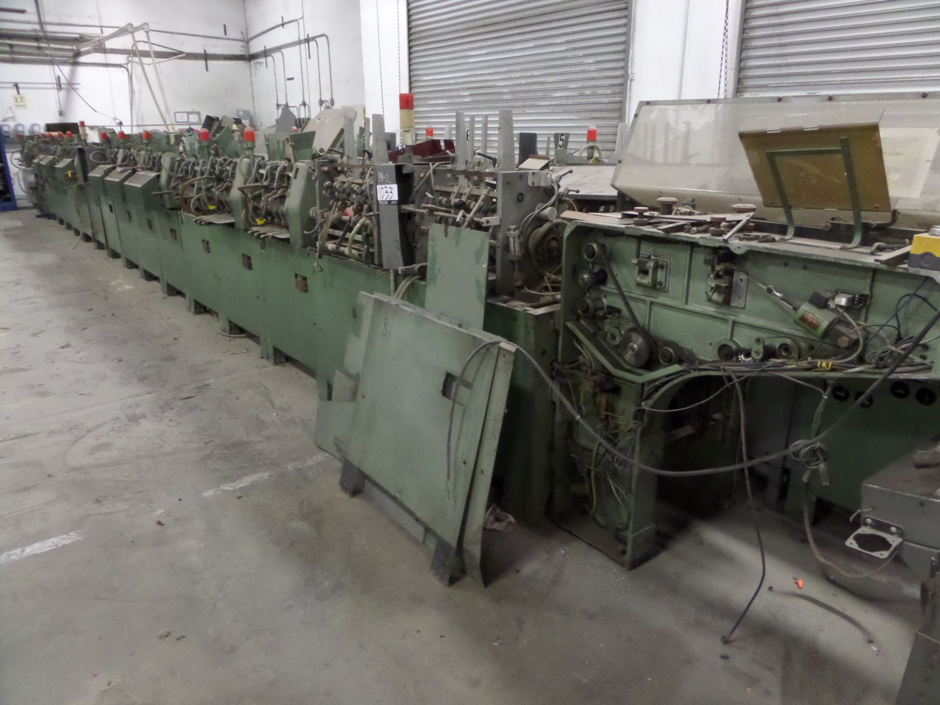 Muller 227 News Paper Inserter with 17 Pockets (Partially Disassembled). Asset Location: