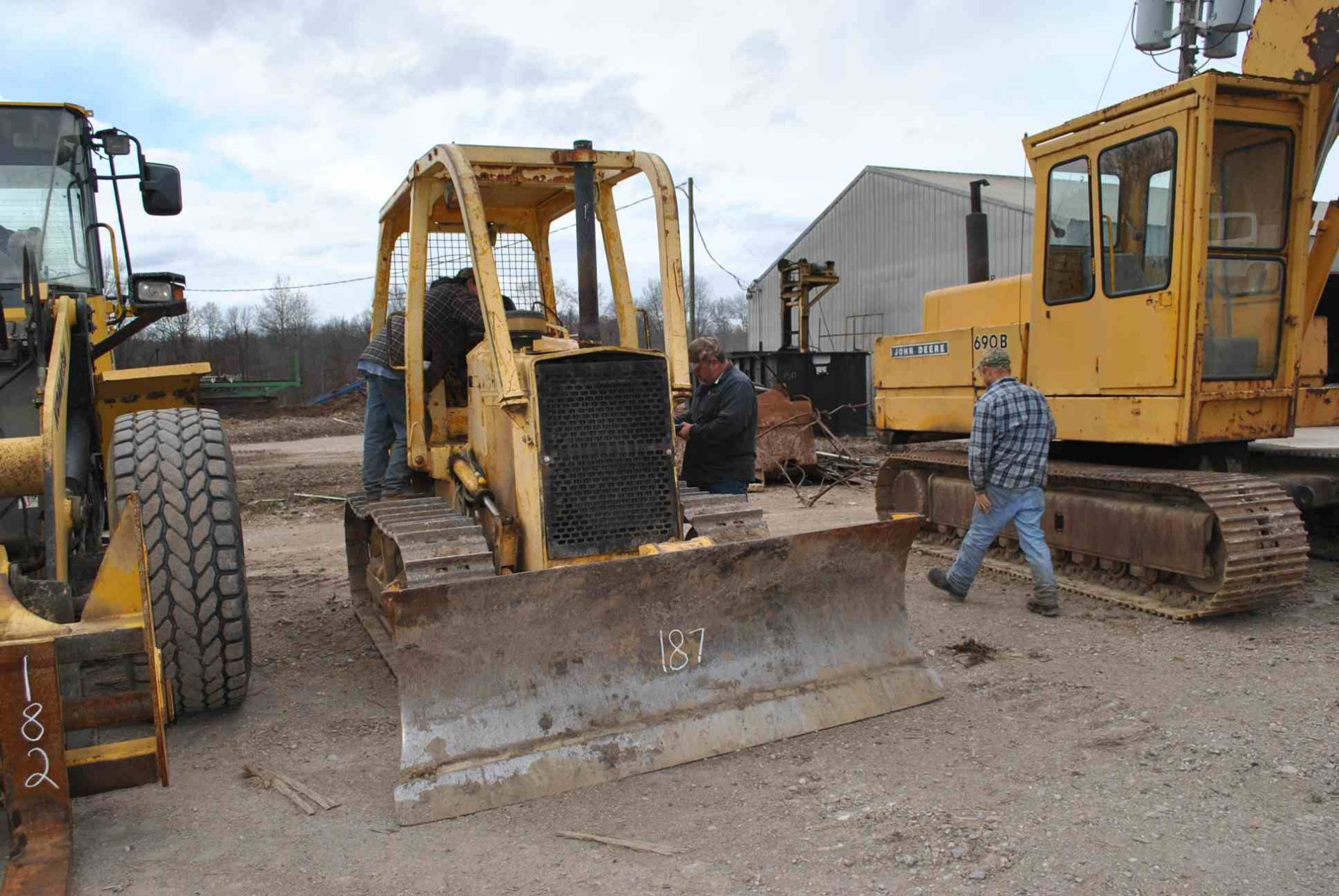 JOHN DEERE 450G DOZER W/6 WAY BLADE; W/CARGO 30 WINCH; S/N-746296; W/8171 HOURS