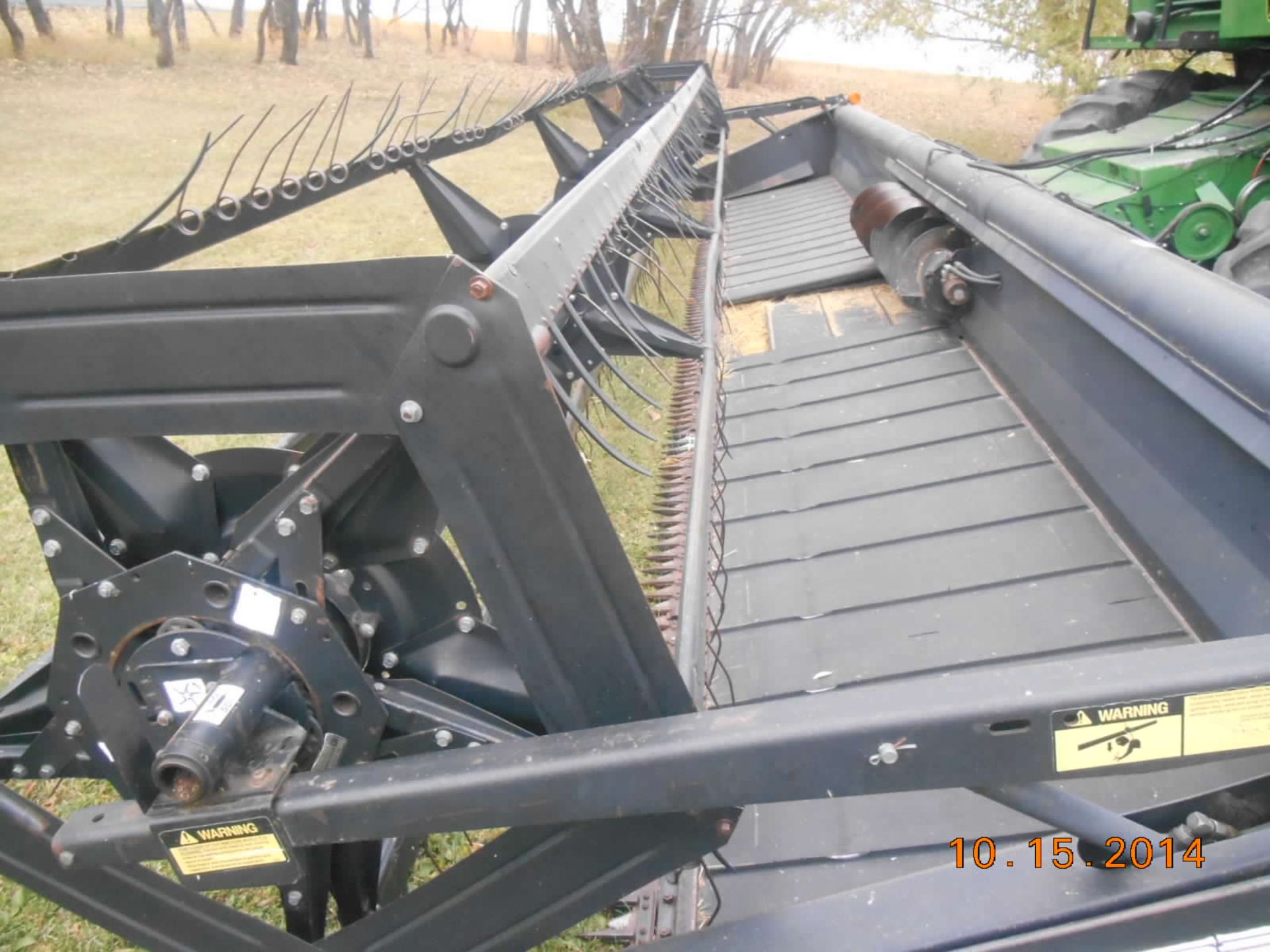 Macdon 960 30â€™ header, pickup reel has own mover, sold separate