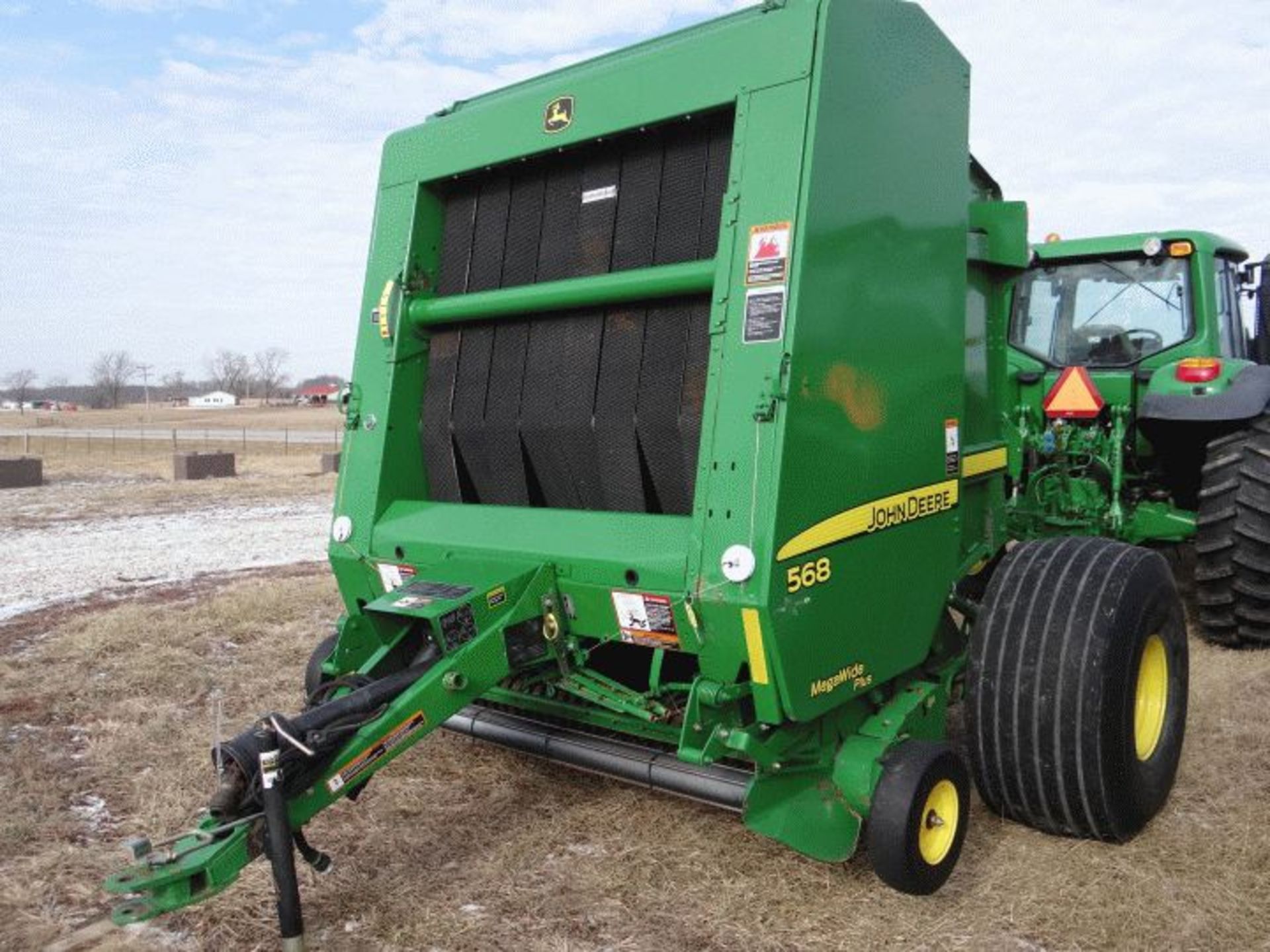 Lot # 241 JD 568 Round Baler, 2011 #109056, 7720 bales, 1000 PTO, High Moisture Kit, Hi Flotation