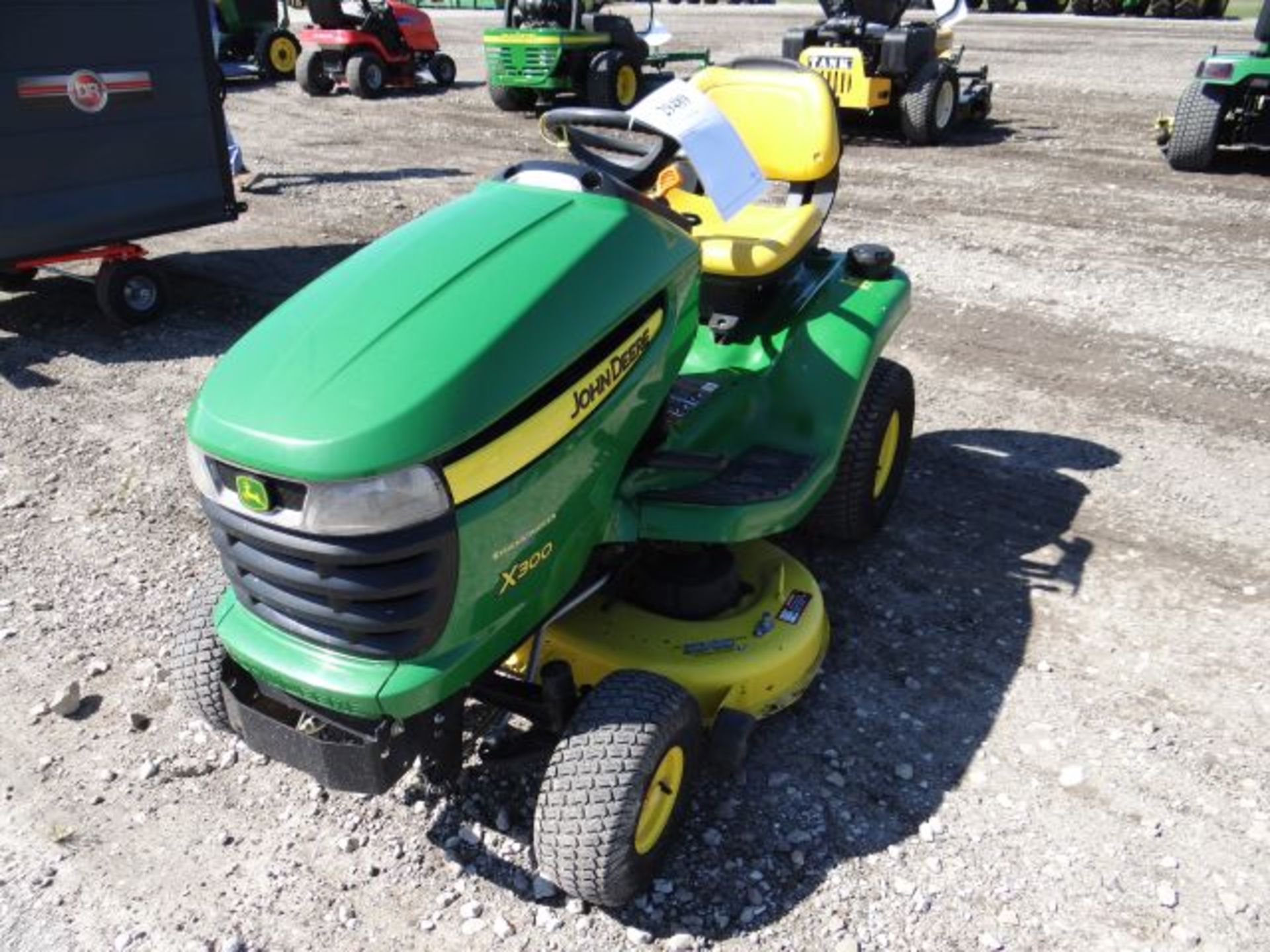 Lot 29489 - 2012 JD X300/42 Mower 908 hrs, 18hp, Kawasaki, Air Cool, Hydro, 42" Deck,