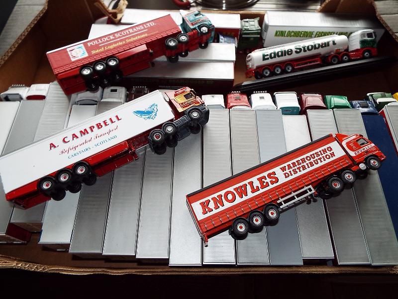 Approximately 26 diecast model truck and trailer combinations to include Corgi and Oxford,