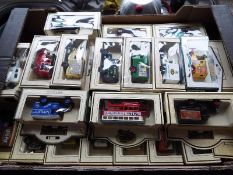 Thirty die-cast model motor vehicles by Lledo / Days Gone,