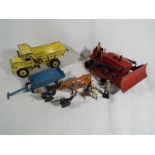 A diecast Supertoys Blaw Knox bulldozer by Meccano Ltd, a Dinky Euclid Rear Dump Truck 965,