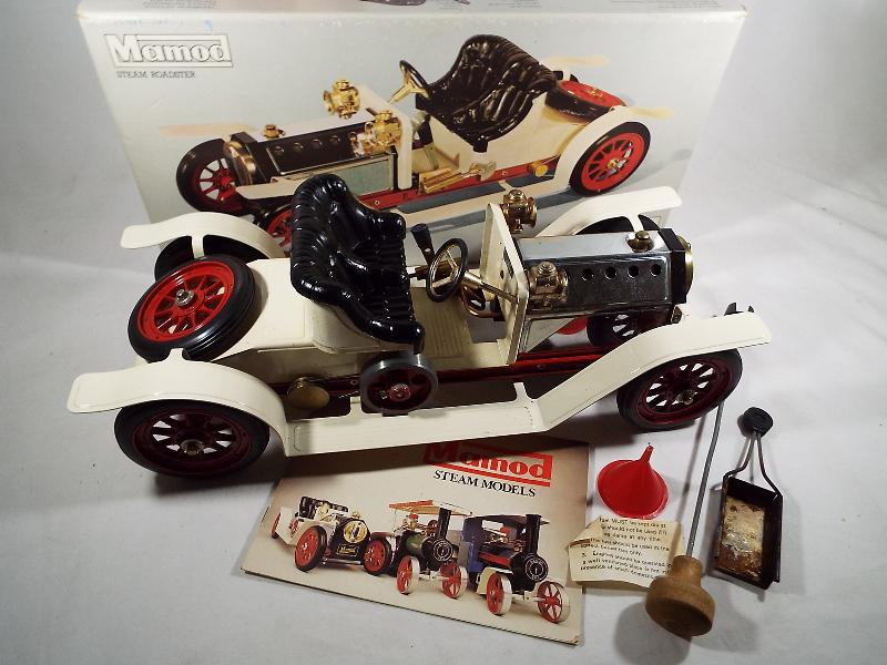 A Mamod steam Roadster with accessories and instruction manual,
