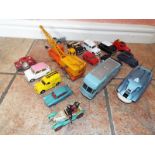 A Dinky Spectrum Pursuit vehicle # 104, a Dinky Supertoys TV mobile control room,