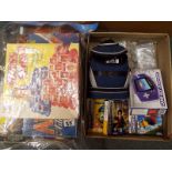 A Nintendo wide colour screen Gameboy, advanced with a bag and accessories,