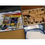 A Scalextric Velodrome Cycling boxed set and a K'Nex Hornet Swarm Dueling Coaster boxed set