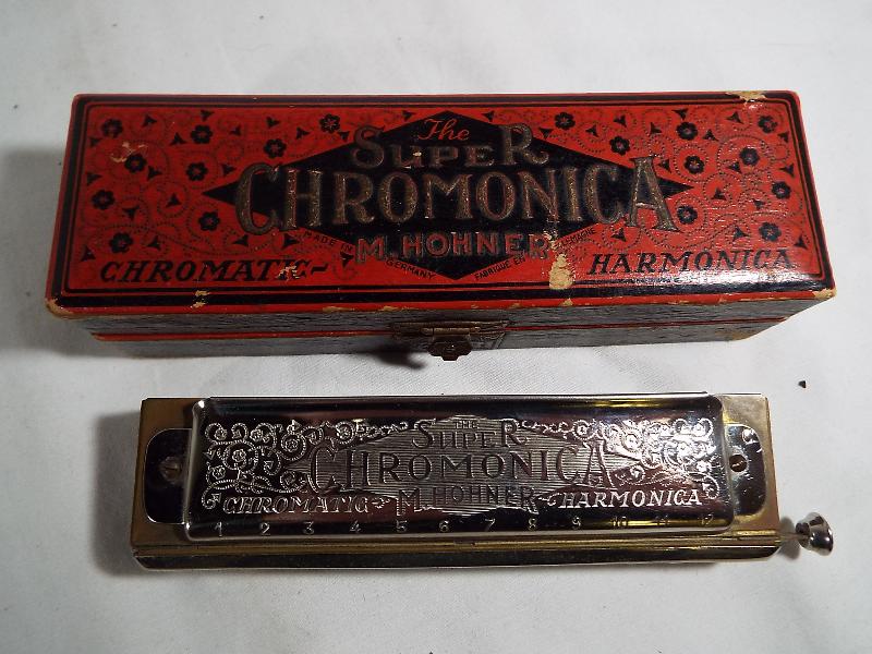 The Super Chromonica chromatic harmonica by Hohner in original case with accompanying manual - Image 2 of 2