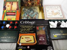 A good mixed lot of parlour games to include backgammon, carpet skittles, carpet bowls,