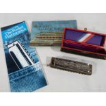 The Super Chromonica chromatic harmonica by Hohner in original case with accompanying manual